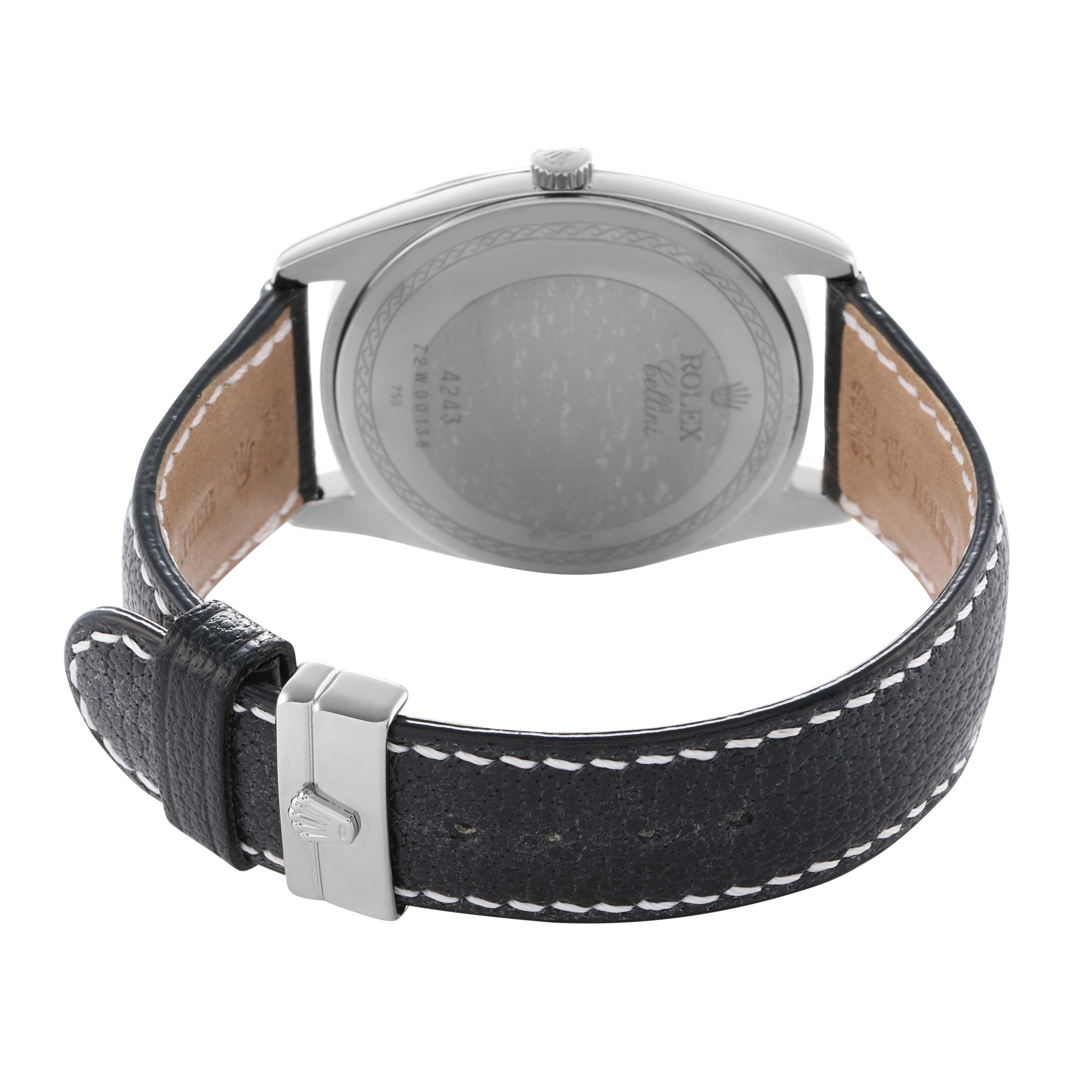 The image shows the back of a Rolex Cellini 4243/9-BIC Men's White Gold Black Dial watch at an angle highlighting the case back and leather strap with buckle.