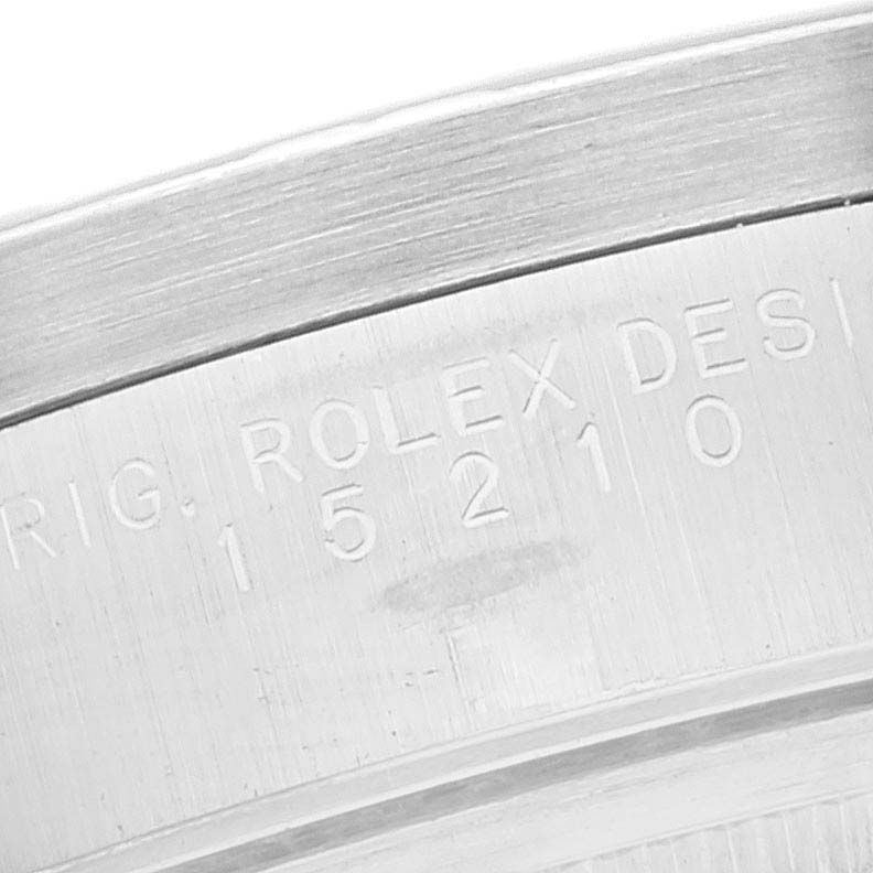 This image shows a close-up of the side of a Rolex Date 15210 Men's Stainless Steel Black Dial 15210 Men's Stainless Steel Black Dial watch, focusing on the engraved model number.