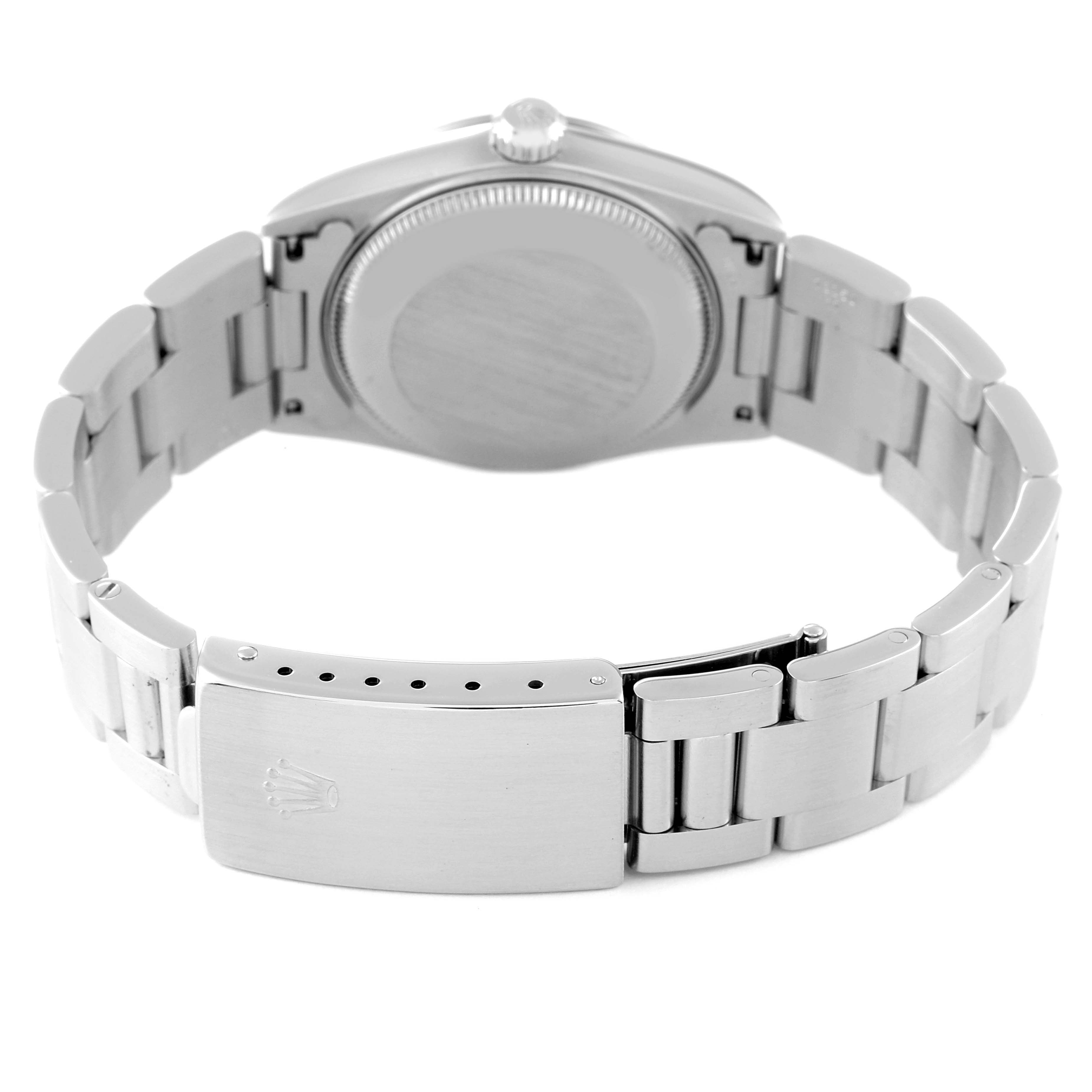 This image shows the back view of a Rolex Mid-Size 78240 Women
s Stainless Steel Blue Dial 78240 Women
s Stainless Steel Blue Dial watch, highlighting its stainless steel bracelet and clasp.