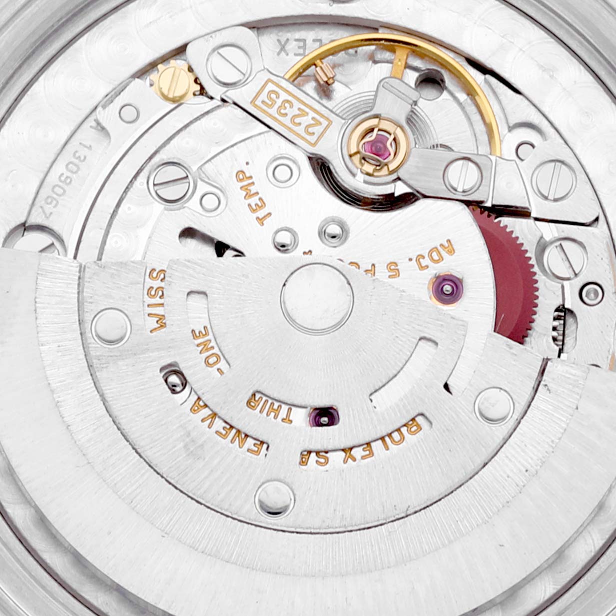 This image shows a close-up view of the internal mechanism of a Mid-Size Rolex watch.