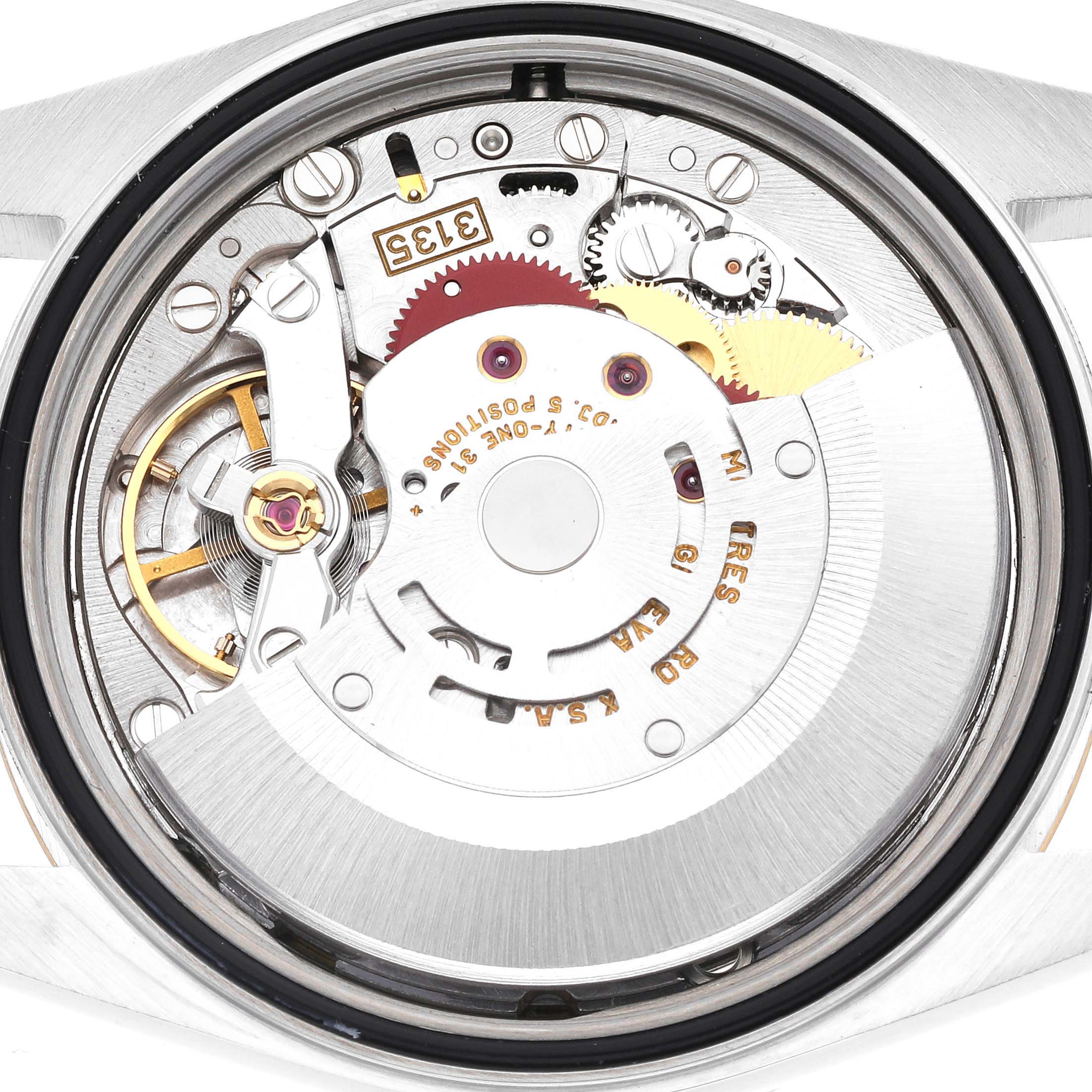 The image shows the inner movement of the Rolex Datejust 16233 Men's Steel and Gold (two tone) Champagne Dial 16233 Men's Steel and Gold (two tone) Champagne Dial watch, highlighting gears and mechanical components.