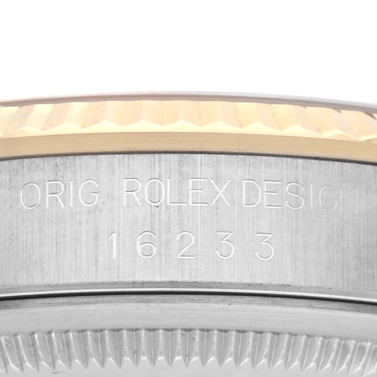 The image shows a close-up side view of the Rolex Datejust 16233 Men's Steel and Gold (two tone) Champagne Dial 16233 Men's Steel and Gold (two tone) Champagne Dial's case with the model number 16233 engraved.