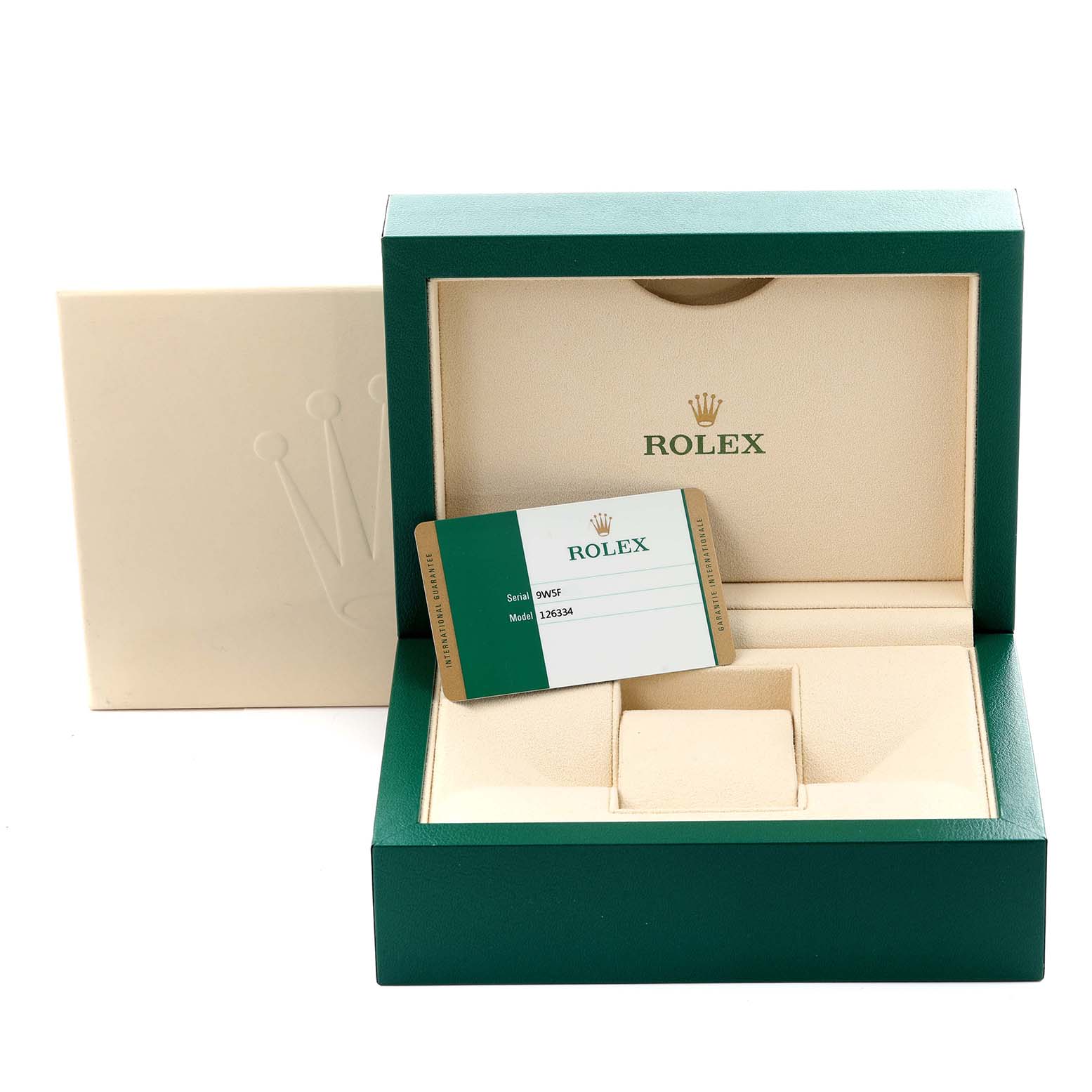 The image shows an open Rolex Datejust 41 126334 Men's Stainless Steel Black Dial 126334 Men's Stainless Steel Black Dial box with a warranty card, but the watch itself isn't visible.