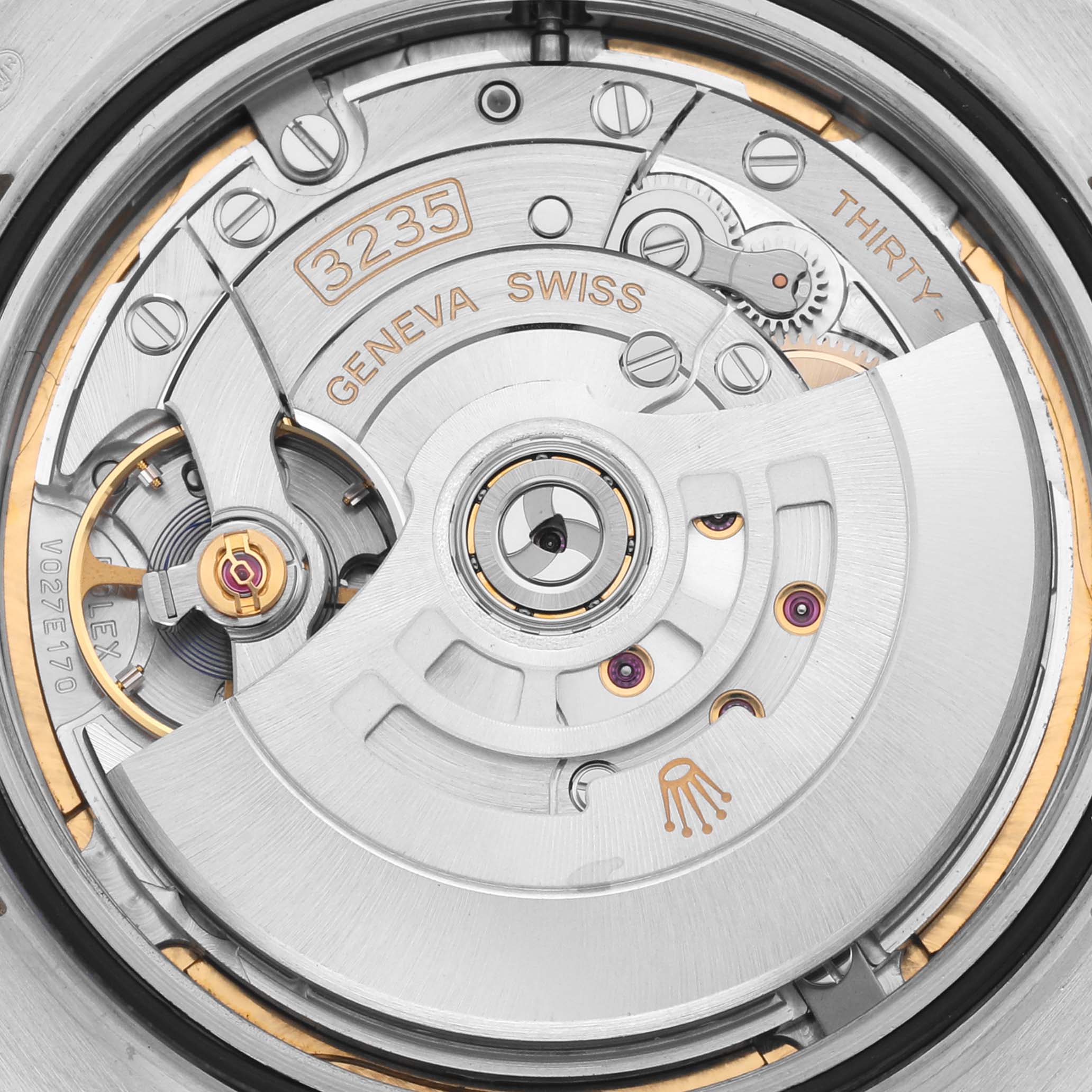 This is an up-close view of the movement inside the Rolex Datejust 41 126333 Men's Steel and Gold (two tone) Mother of Pearl Dial 126333 Men's Steel and Gold (two tone) Mother of Pearl Dial, showing the rotor and intricate mechanical components.