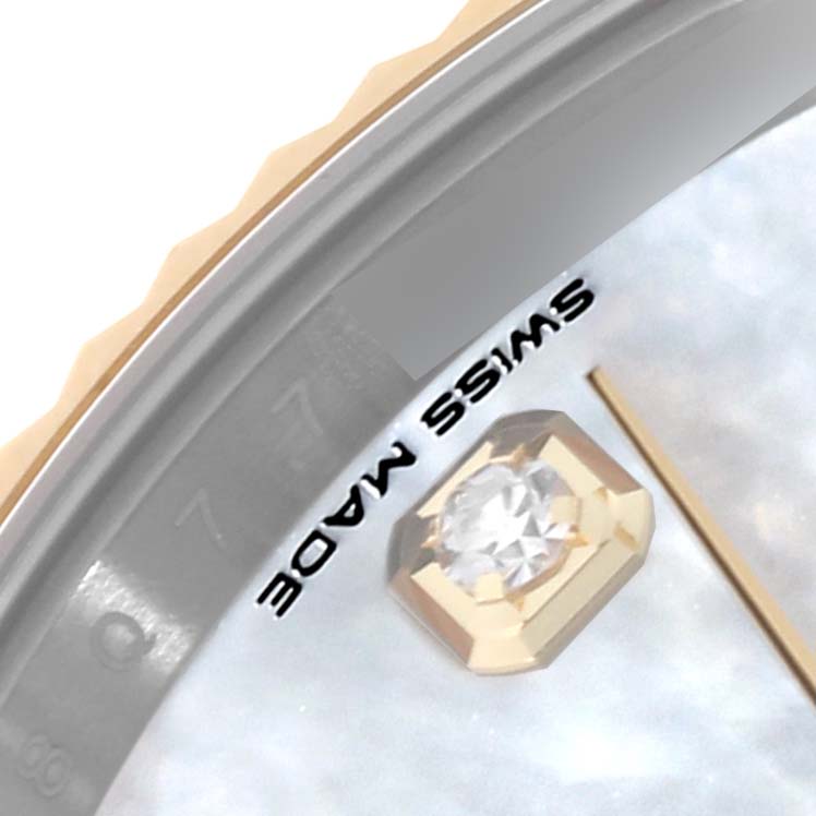 The image shows a close-up of the Rolex Datejust 41 126333 Men's Steel and Gold (two tone) Mother of Pearl Dial 126333 Men's Steel and Gold (two tone) Mother of Pearl Dial, focusing on the bezel, part of the dial, and a diamond marker.