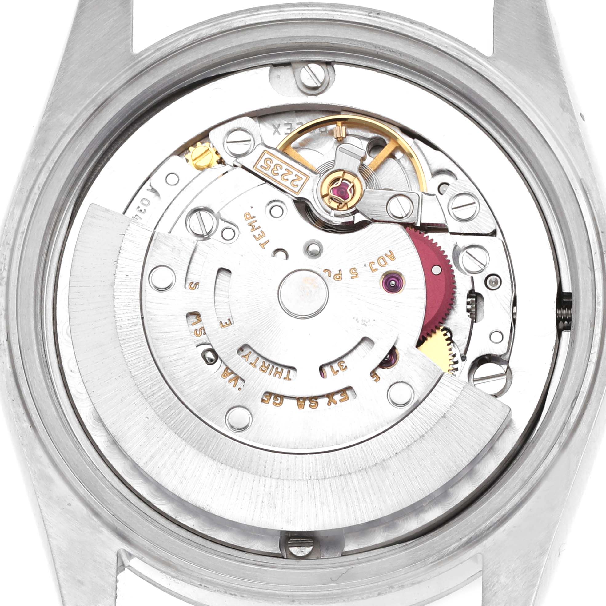 The image shows the movement of a Rolex Datejust 78274 Women's Stainless Steel Silver Dial watch from a rear angle, highlighting the rotor and mechanism details.