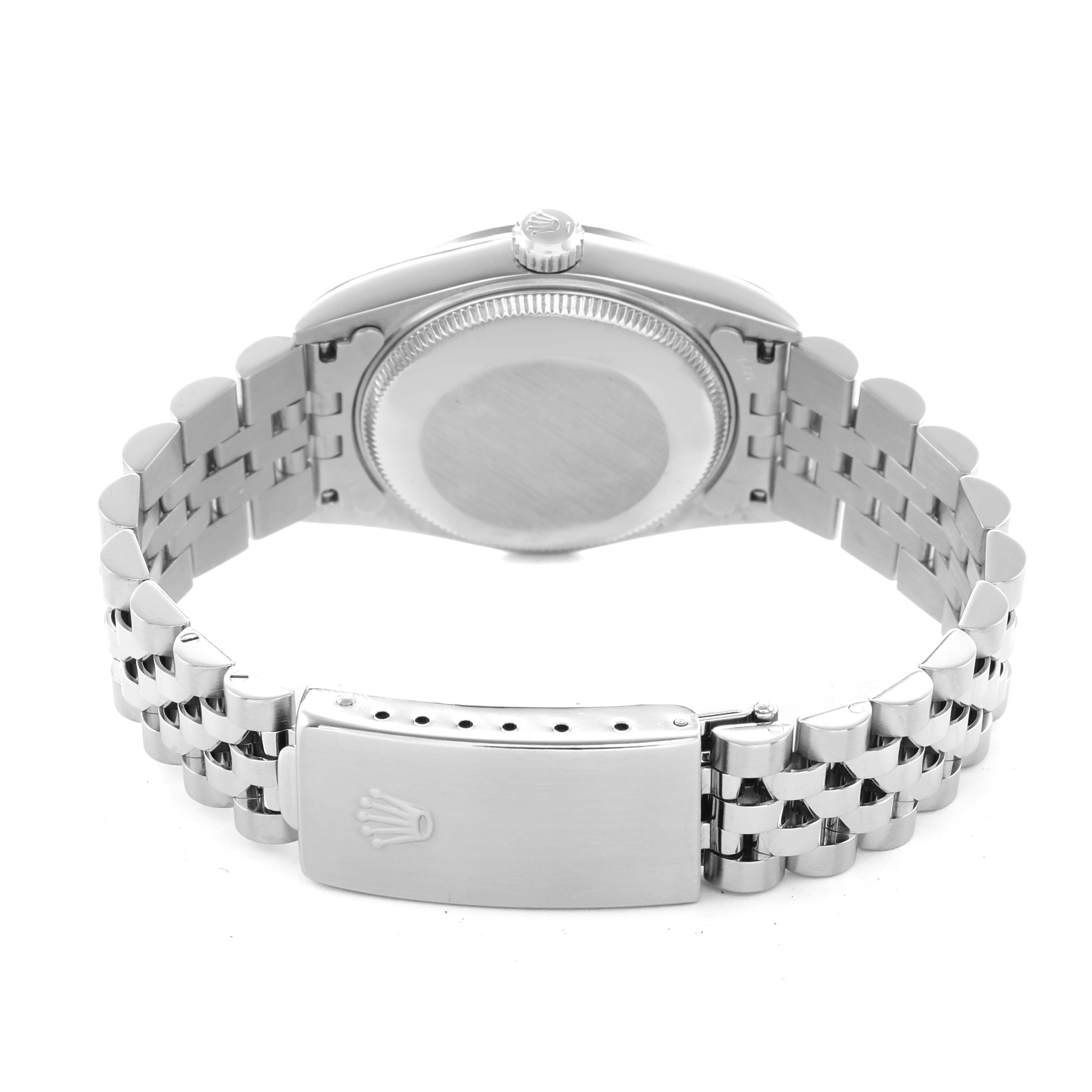The image shows a Rolex Datejust 78274 Women's Stainless Steel Silver Dial watch from the back, highlighting the case, bezel, crown, and closed clasp on the bracelet.