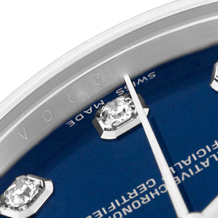 The close-up image shows the dial edge and diamond markers of a Rolex Mid-Size 178274 Women's Stainless Steel Blue Dial 178274 Women's Stainless Steel Blue Dial watch with a blue face.