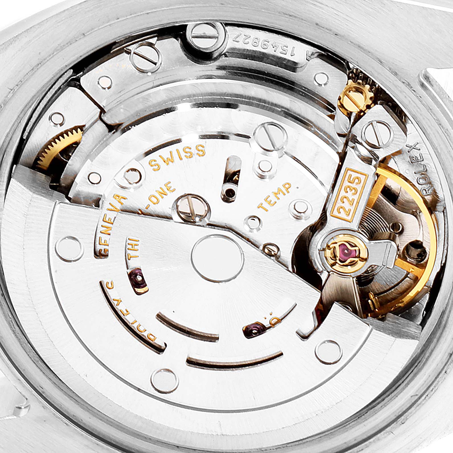 This close-up image shows the intricate movement and components inside a Rolex Datejust 179173 Women's Steel and Gold (two tone) Black Dial 179173 Women's Steel and Gold (two tone) Black Dial watch.