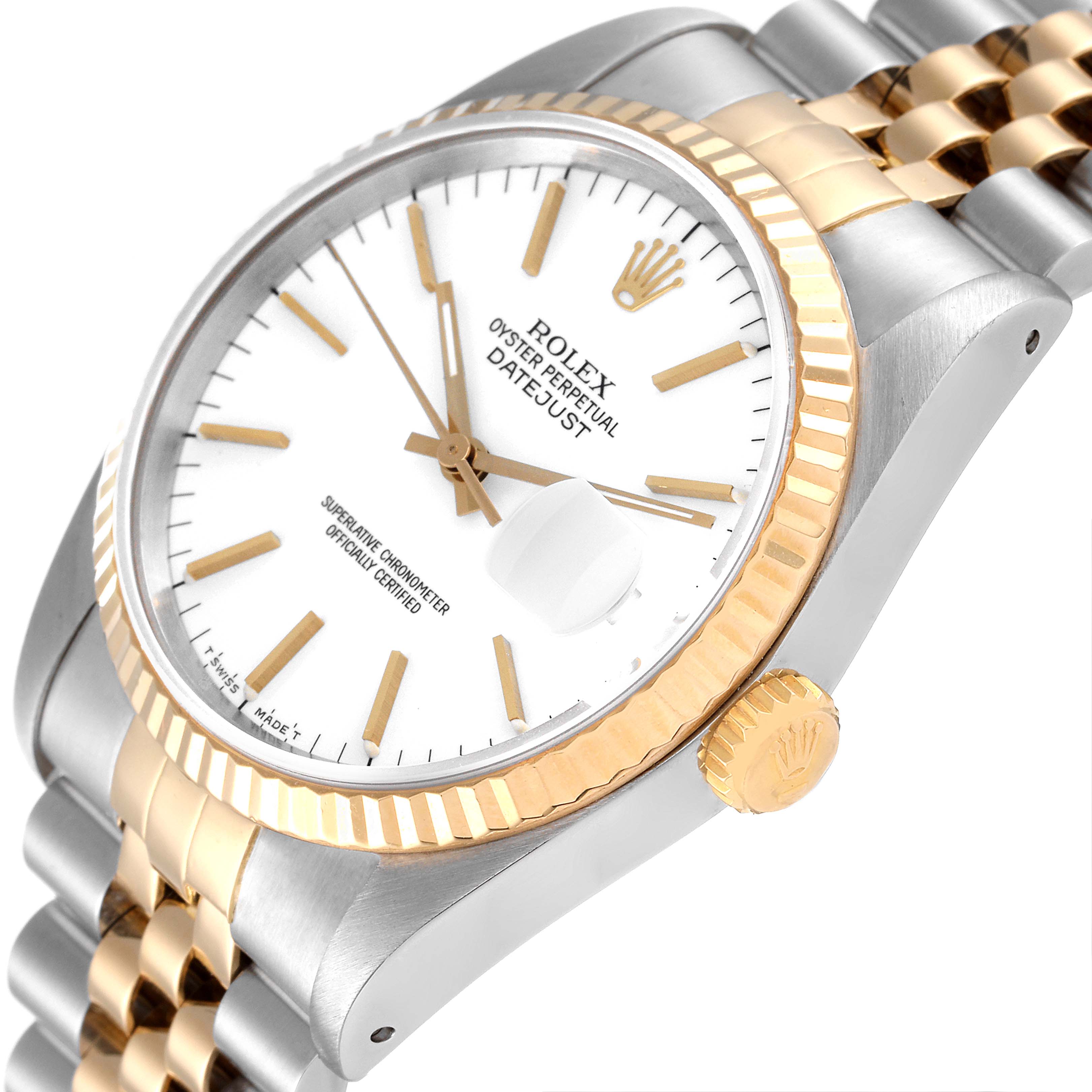 This image shows a close-up, angled view of a Rolex Datejust 16233 Men's Steel and Gold (two tone) White Dial 16233 Men's Steel and Gold (two tone) White Dial watch, highlighting its dial, crown, bezel, and bracelet.