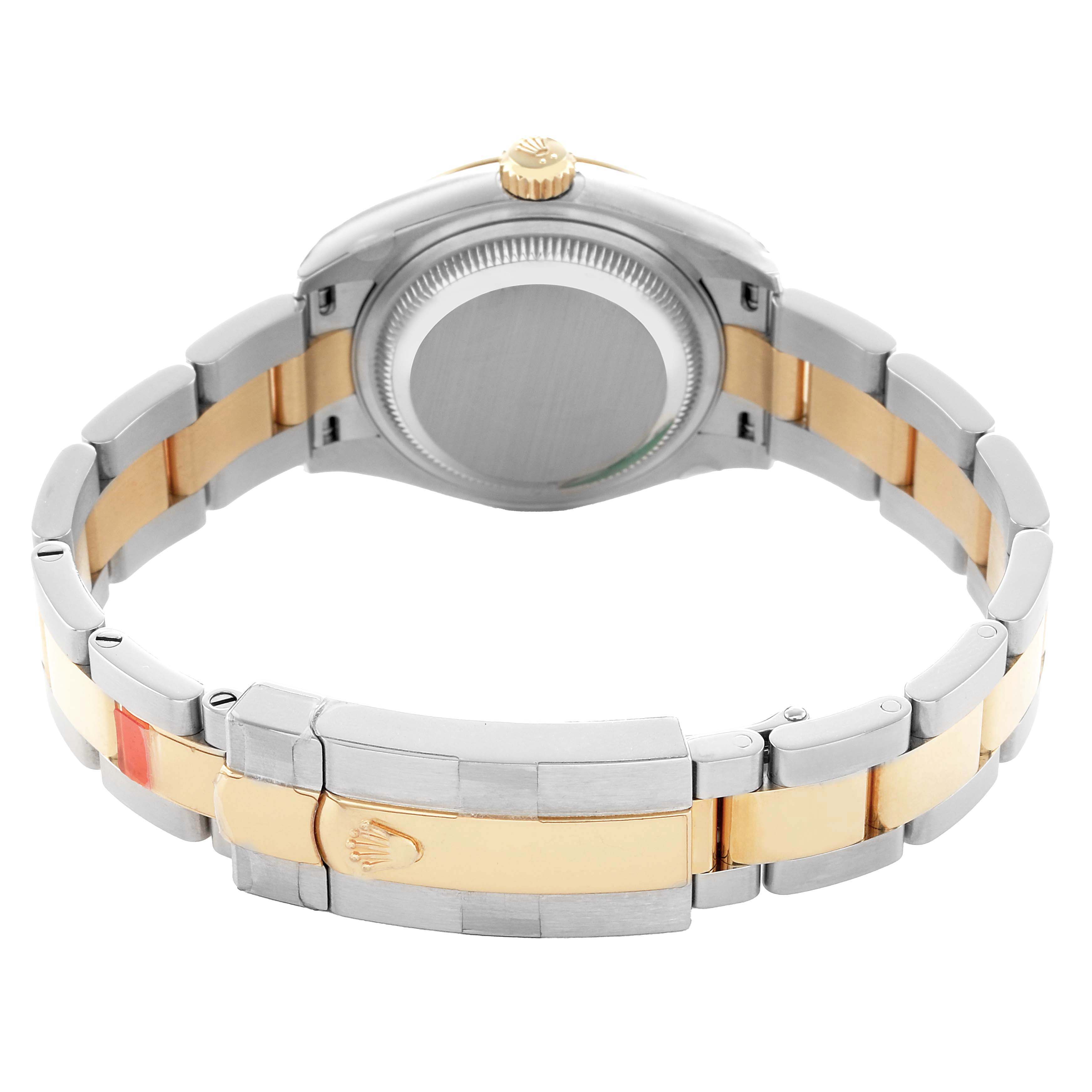The image shows the back and clasp of a Rolex Datejust 279163 Women's Steel and Gold (two tone) White Dial watch, featuring a two-tone metal bracelet.