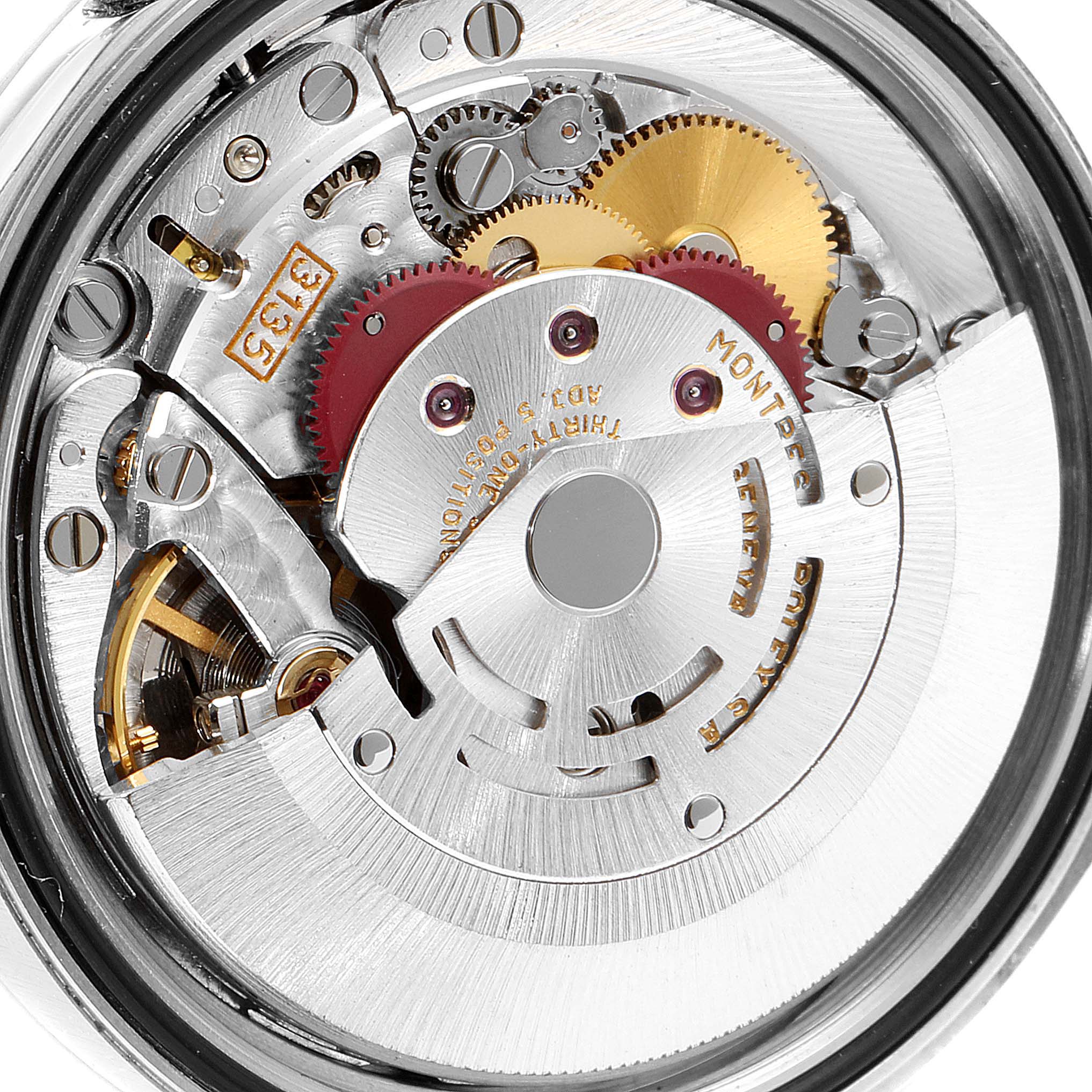 The image shows the internal mechanism of a Rolex Datejust 16233 Men's Steel and Gold (two tone) White Dial 16233 Men's Steel and Gold (two tone) White Dial watch, focusing on its gears and movement components.