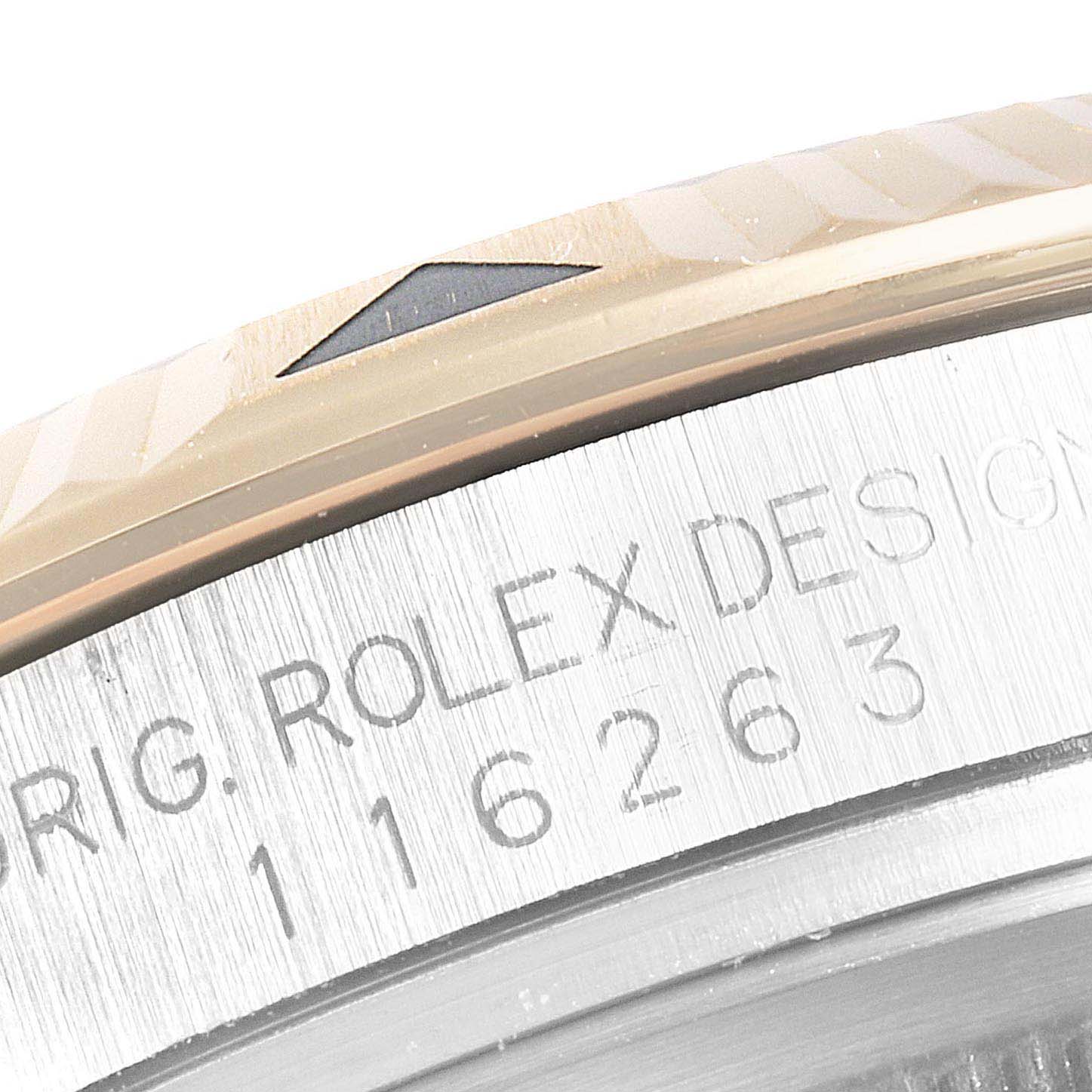 This image shows a close-up angle of the bezel and the engraved model number on a Rolex Turn-o-Graph 116263 Men
s Steel and Gold (two tone) Champagne Dial 116263 Men
s Steel and Gold (two tone) Champagne Dial watch.