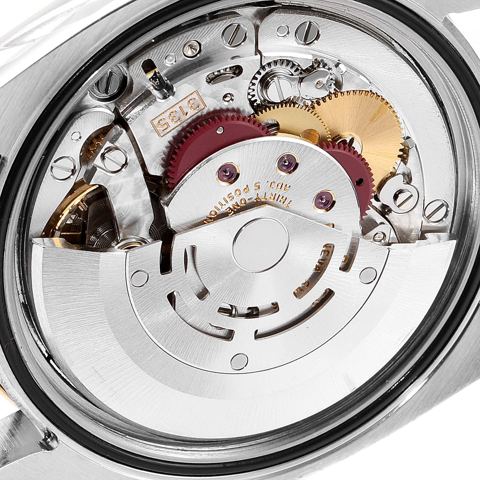 This image shows the internal movement mechanism of a Rolex Turn-o-Graph 116263 Men
s Steel and Gold (two tone) Champagne Dial 116263 Men
s Steel and Gold (two tone) Champagne Dial watch, viewed from the back.