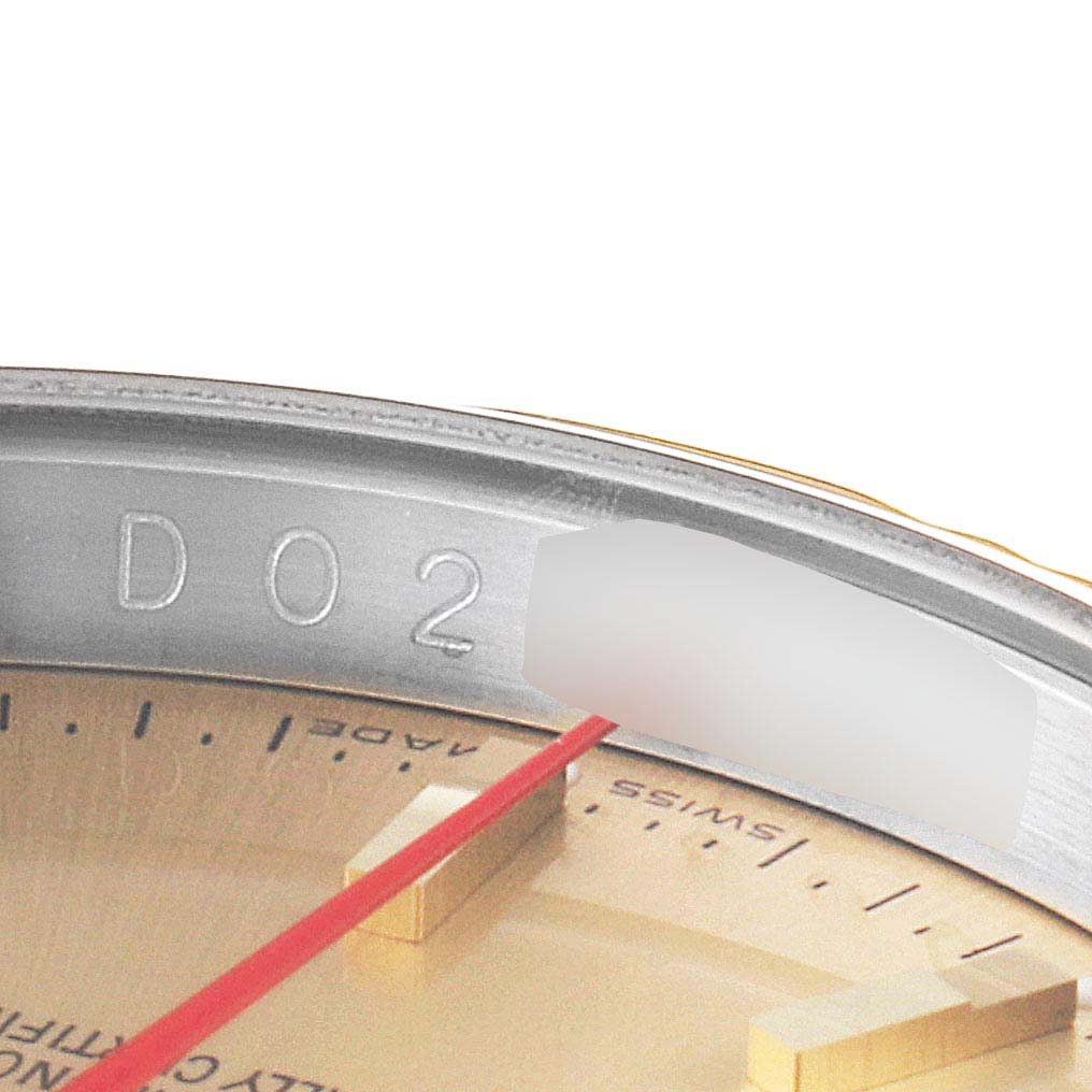 This close-up image of a Rolex Turn-o-Graph 116263 Men
s Steel and Gold (two tone) Champagne Dial 116263 Men
s Steel and Gold (two tone) Champagne Dial shows the dial, part of the bezel, and part of the serial number.