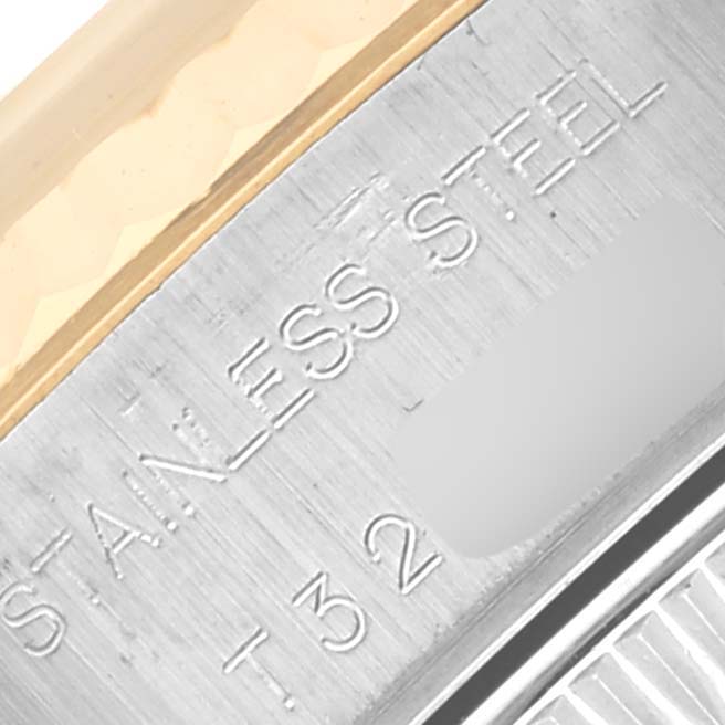 The image shows a close-up of the bezel and part of the side case of a Rolex Datejust 69173 Women's Steel and Gold (two tone) Blue Dial 69173 Women's Steel and Gold (two tone) Blue Dial watch.