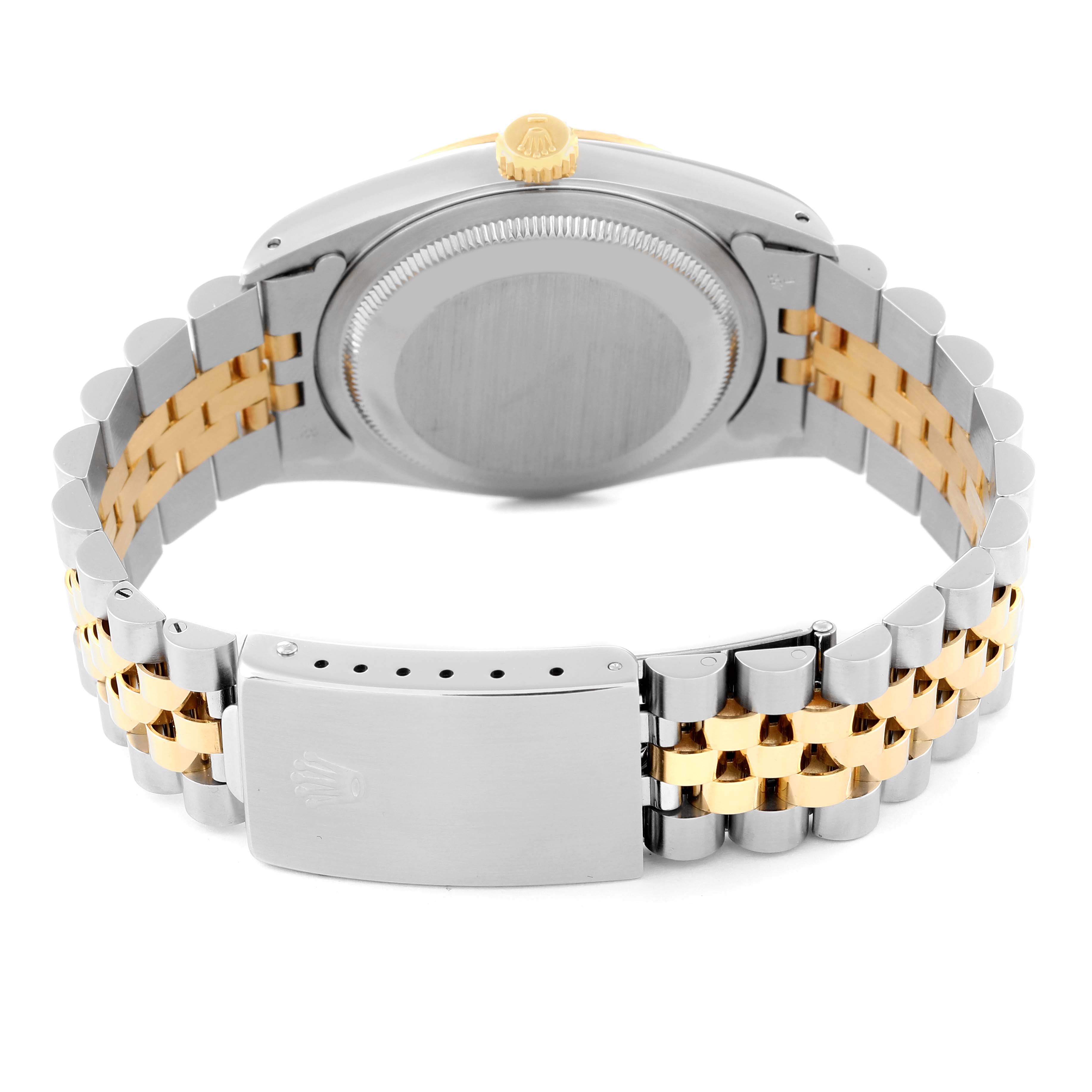 This image shows the back and clasp of a Rolex Datejust 16233 Men's Steel and Gold (two tone) White Dial 16233 Men's Steel and Gold (two tone) White Dial watch, highlighting the two-tone bracelet and the underside of the case.