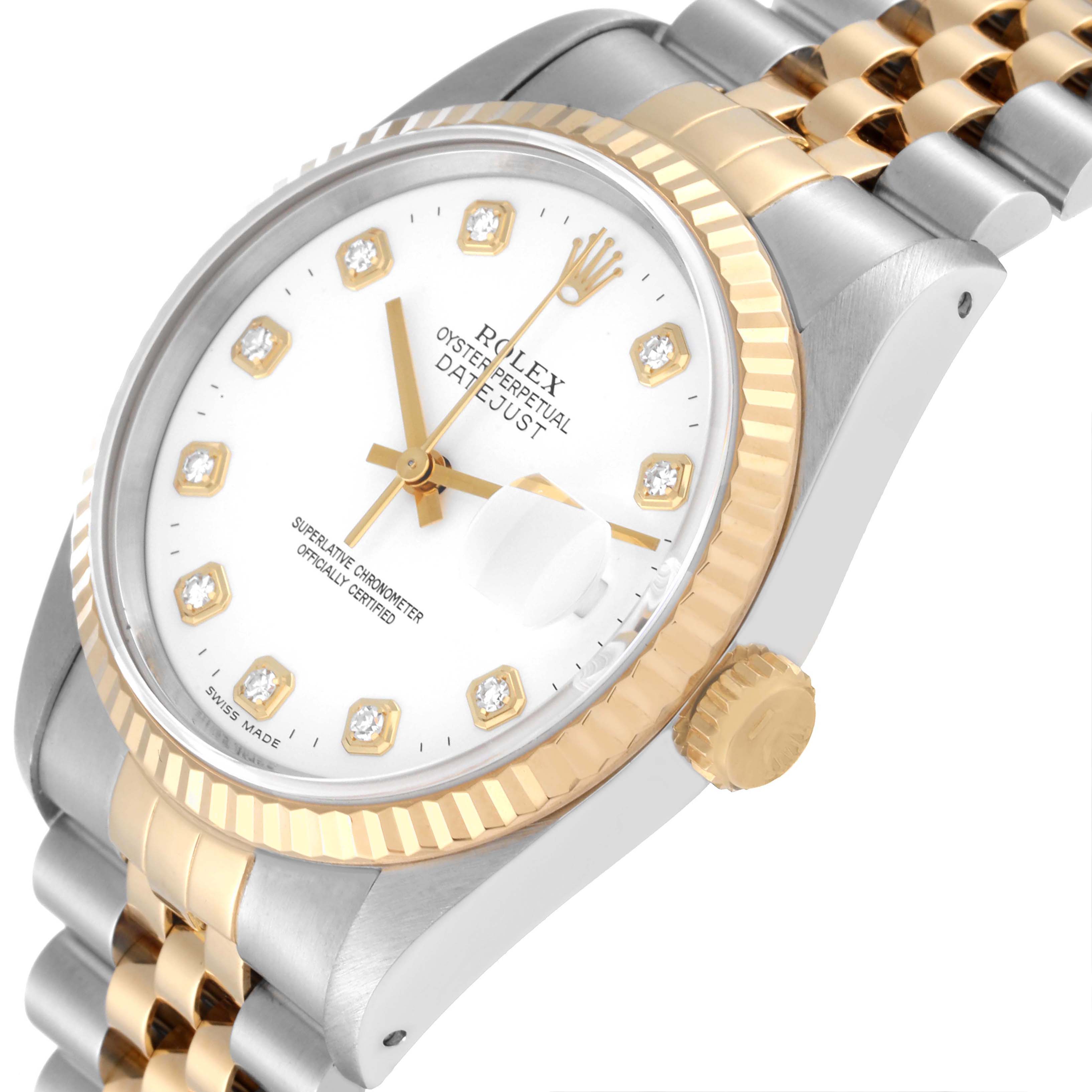 This image shows a side angle of the Rolex Datejust 16233 Men's Steel and Gold (two tone) White Dial 16233 Men's Steel and Gold (two tone) White Dial watch, highlighting the gold fluted bezel, dial, and two-tone bracelet.
