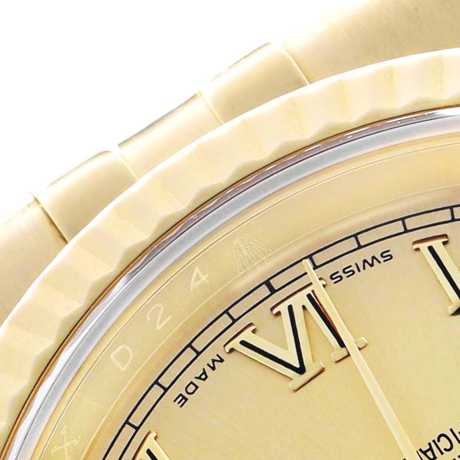 The image shows a close-up of the Rolex Datejust 116238 Women's Yellow Gold Champagne Dial watch face, highlighting the bezel, part of the bracelet, and Roman numerals.