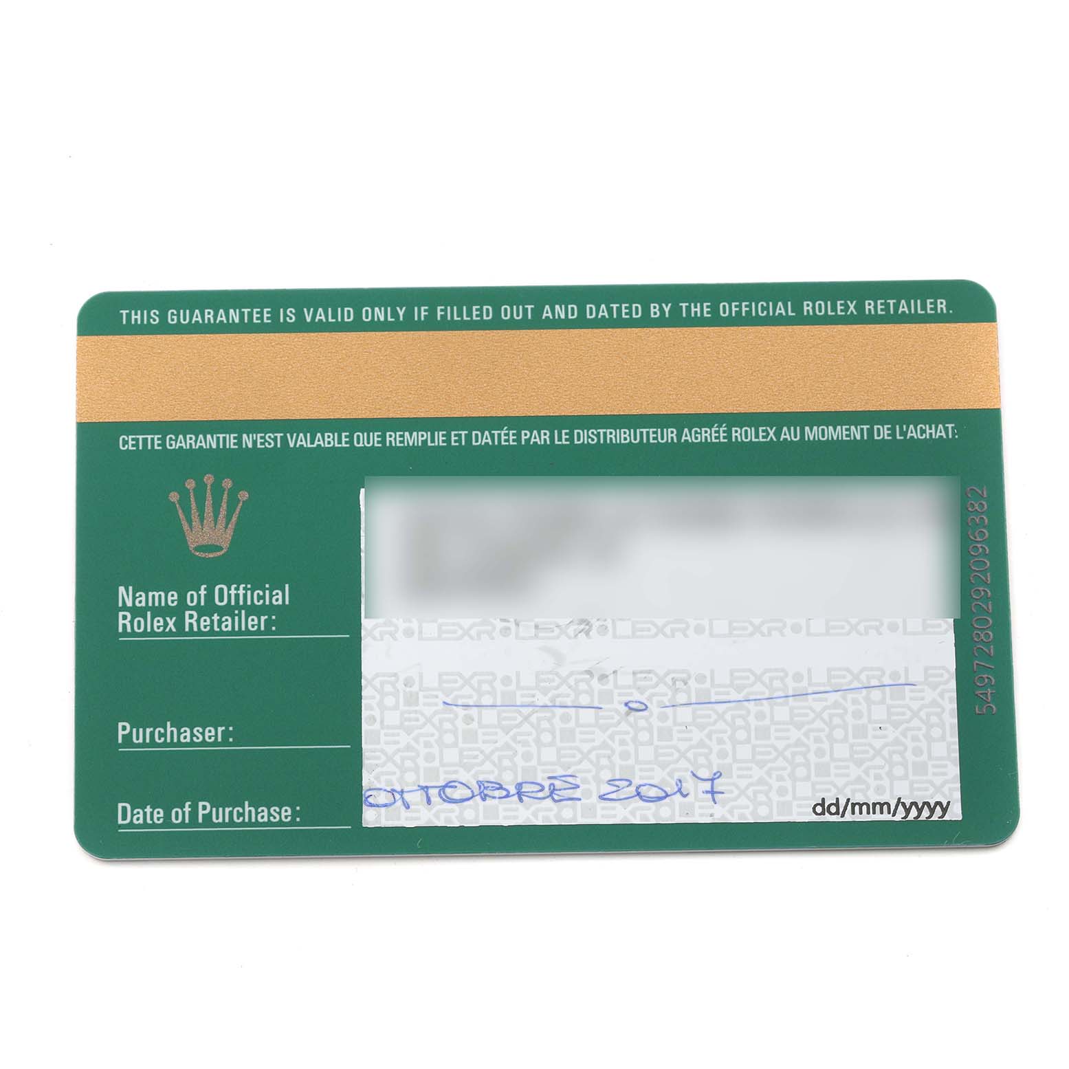 The image shows a close-up of the guarantee card for the Rolex Explorer 214270 Men
s Stainless Steel Black Dial 214270 Men
s Stainless Steel Black Dial watch.