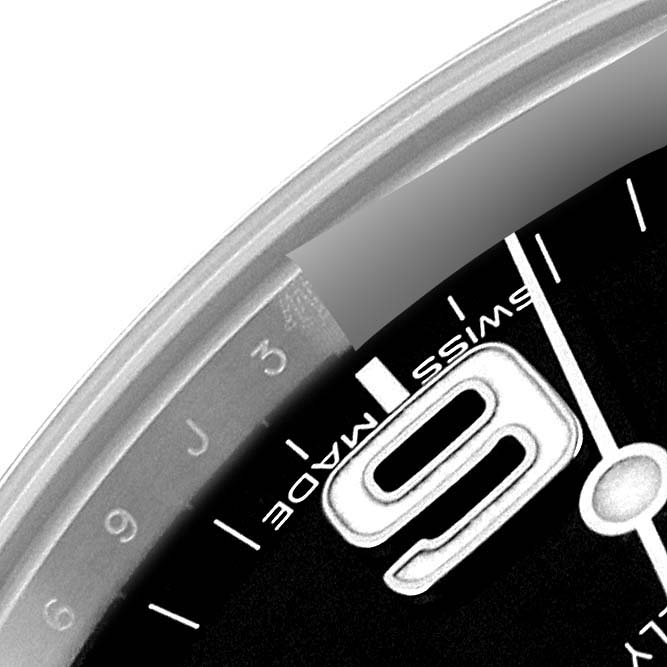 The image shows a close-up of the dial, including the "SWISS MADE" text and the number 9, on a Rolex Explorer 214270 Men
s Stainless Steel Black Dial 214270 Men
s Stainless Steel Black Dial watch.