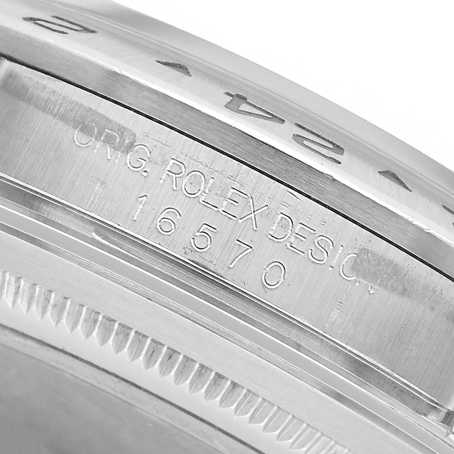 The image shows a close-up angle focusing on the side engravings and bezel of the Rolex Explorer 16570 Men's Stainless Steel White Dial model.