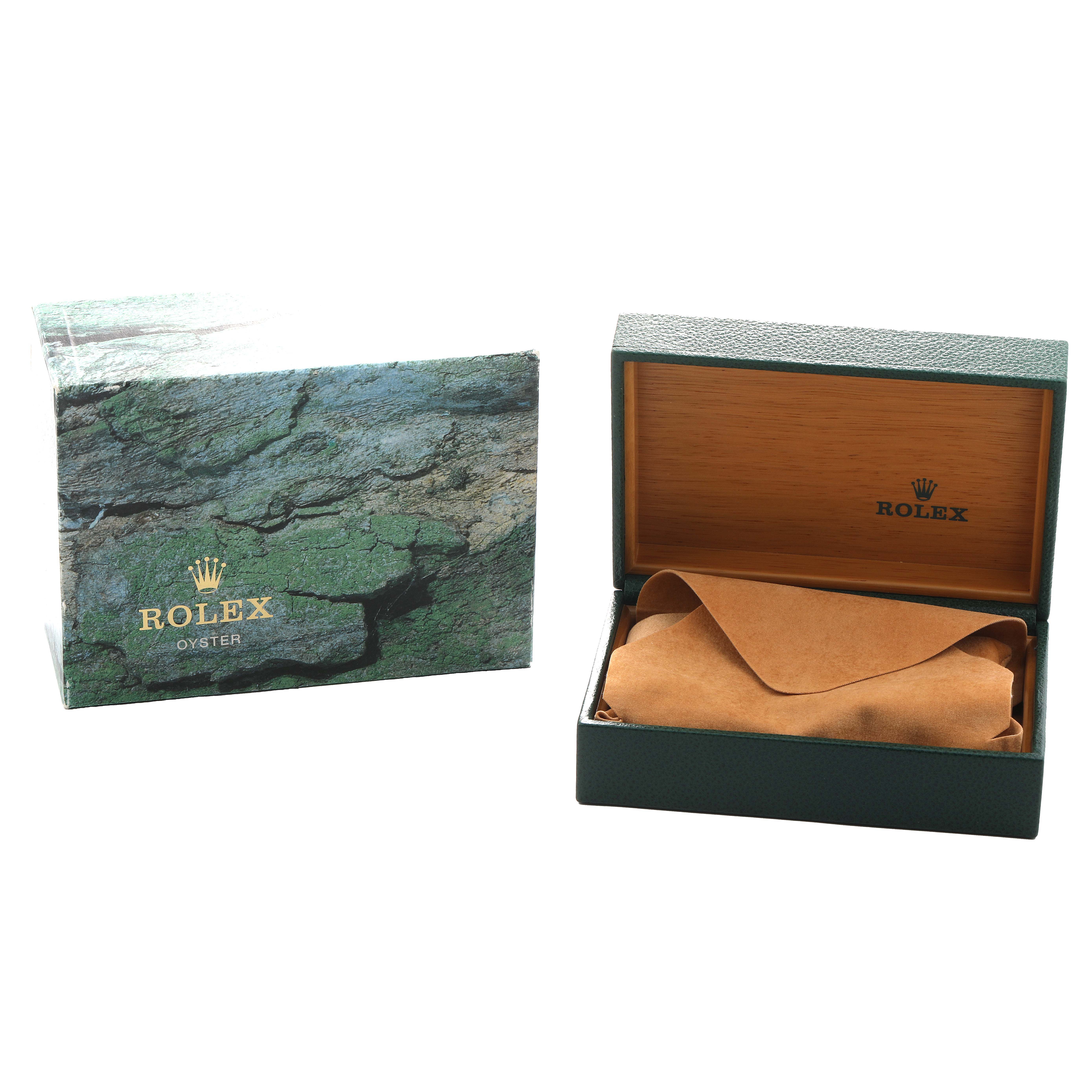 The image shows a Rolex Explorer 16570 Men's Stainless Steel White Dial box and packaging, with the outer box and an open watch case inside.