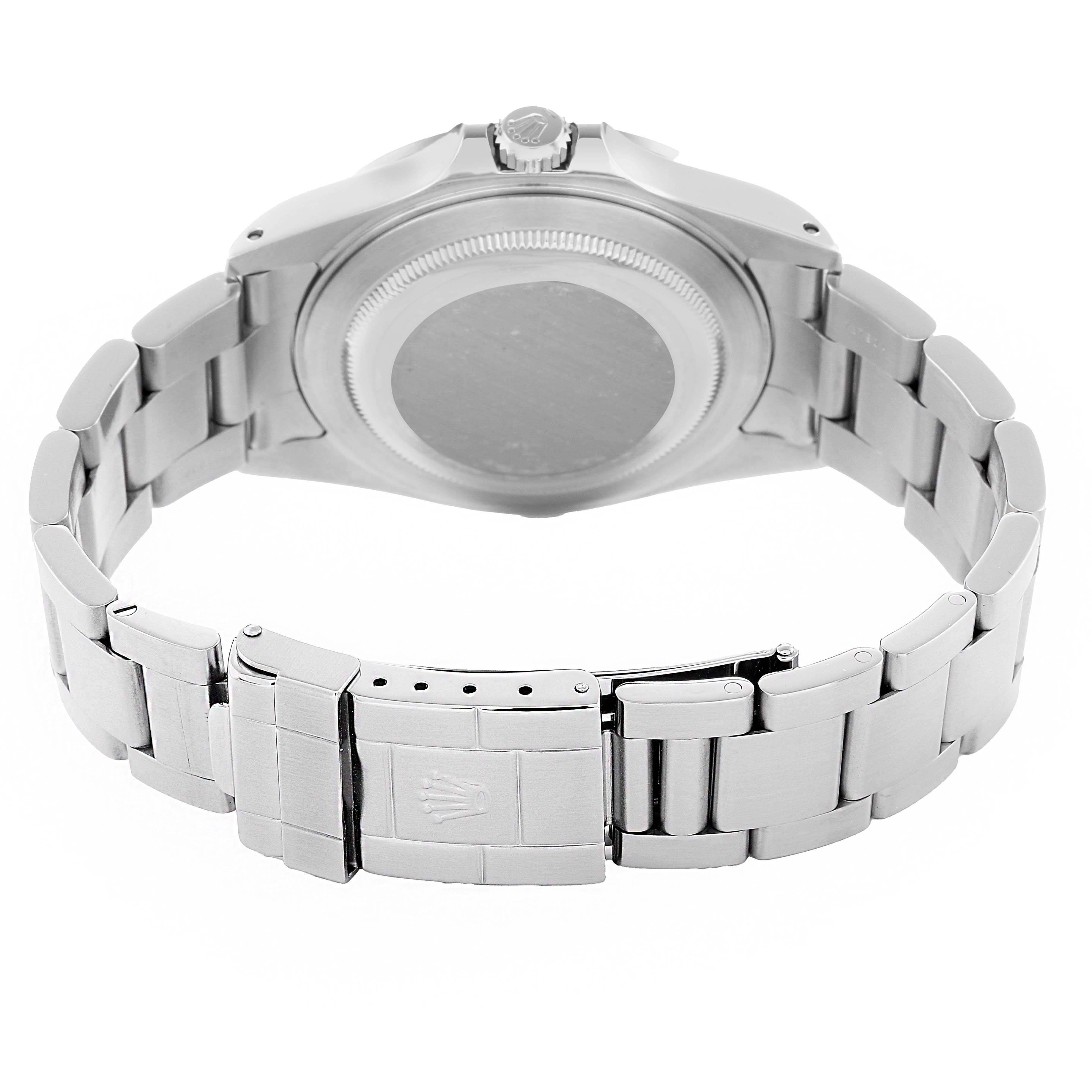 The image shows a Rolex Explorer 16570 Men's Stainless Steel White Dial watch from the rear, highlighting the bracelet, clasp, and case back.