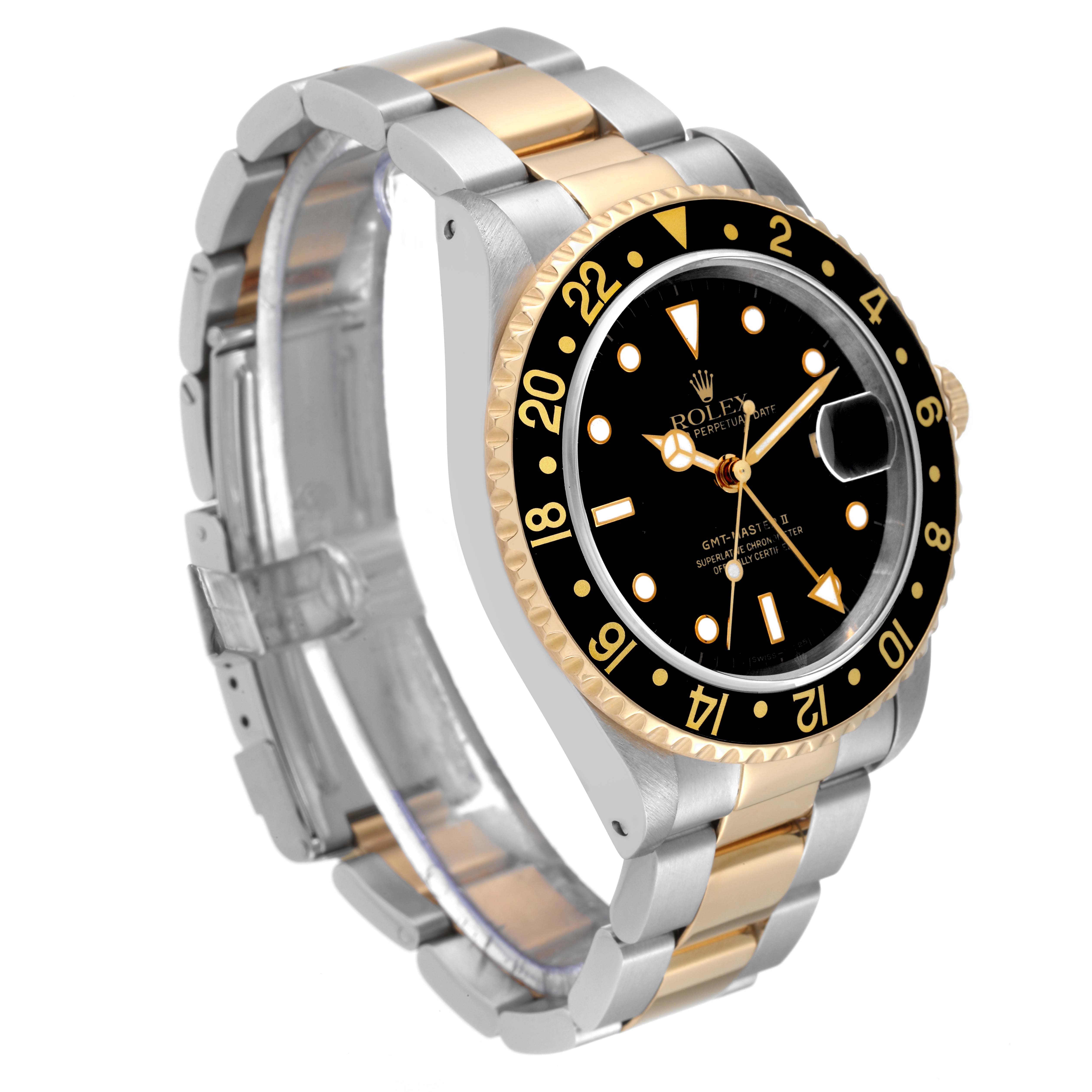 The image shows a side view of a Rolex GMT-Master 16713 Men's Steel and Gold (two tone) Black Dial 16713 Men's Steel and Gold (two tone) Black Dial watch, featuring a two-tone bracelet, black bezel, and black dial with gold accents.