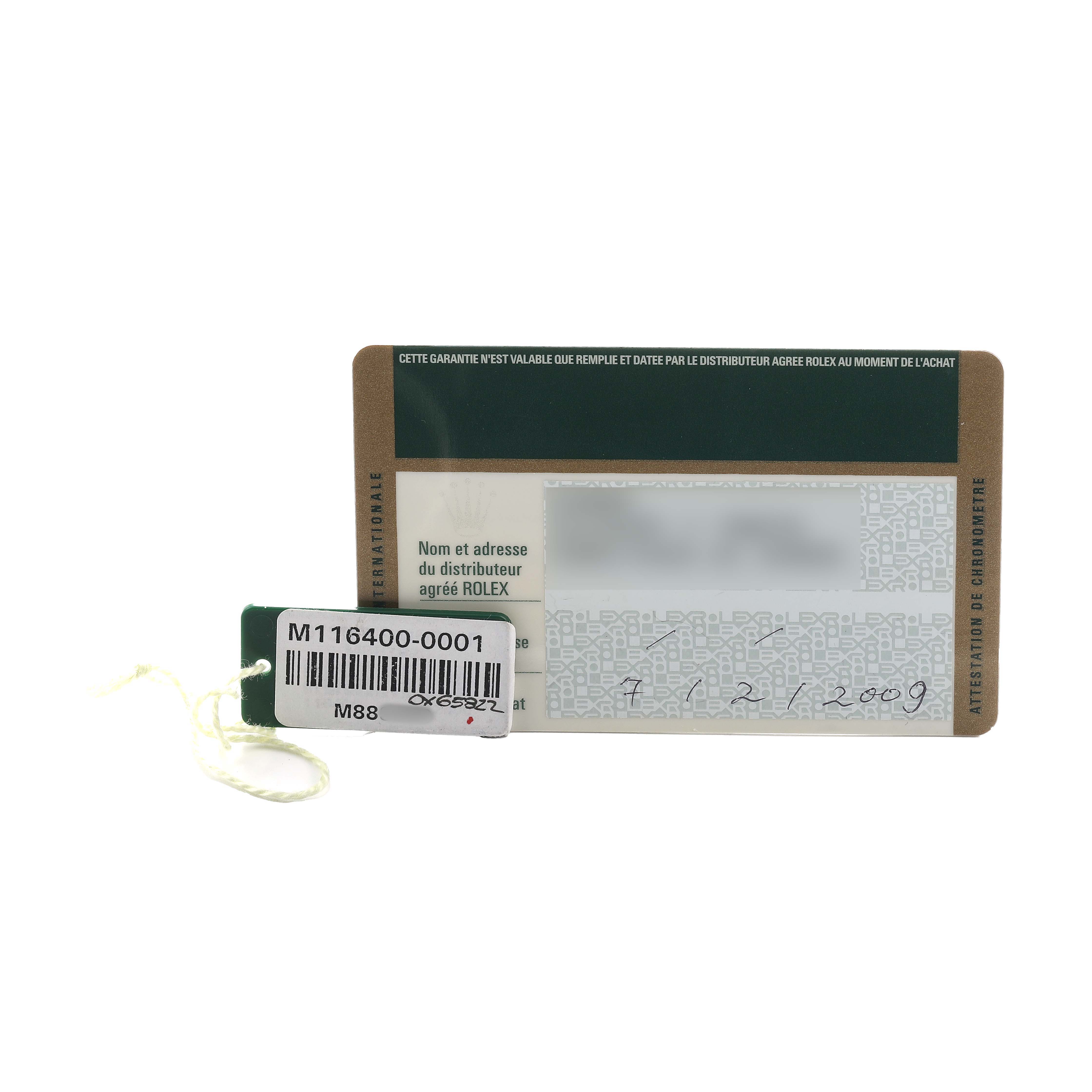 The image shows the warranty card and tag for the Rolex Milgauss 116400 Men's Stainless Steel Black Dial, displayed from a straight-on angle.