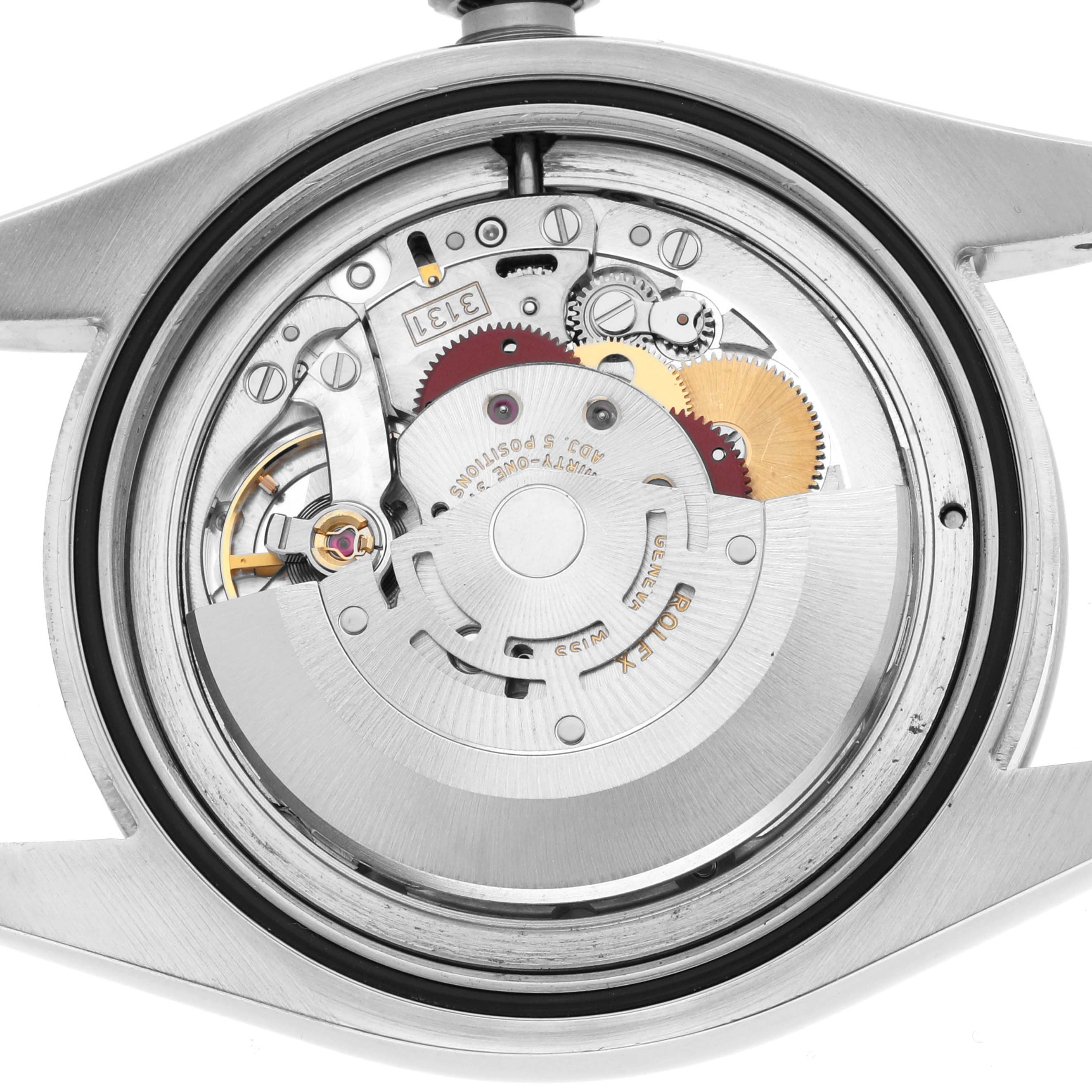 The image shows the movement and internal mechanics of a Rolex Milgauss 116400 Men's Stainless Steel Black Dial watch from a back view.