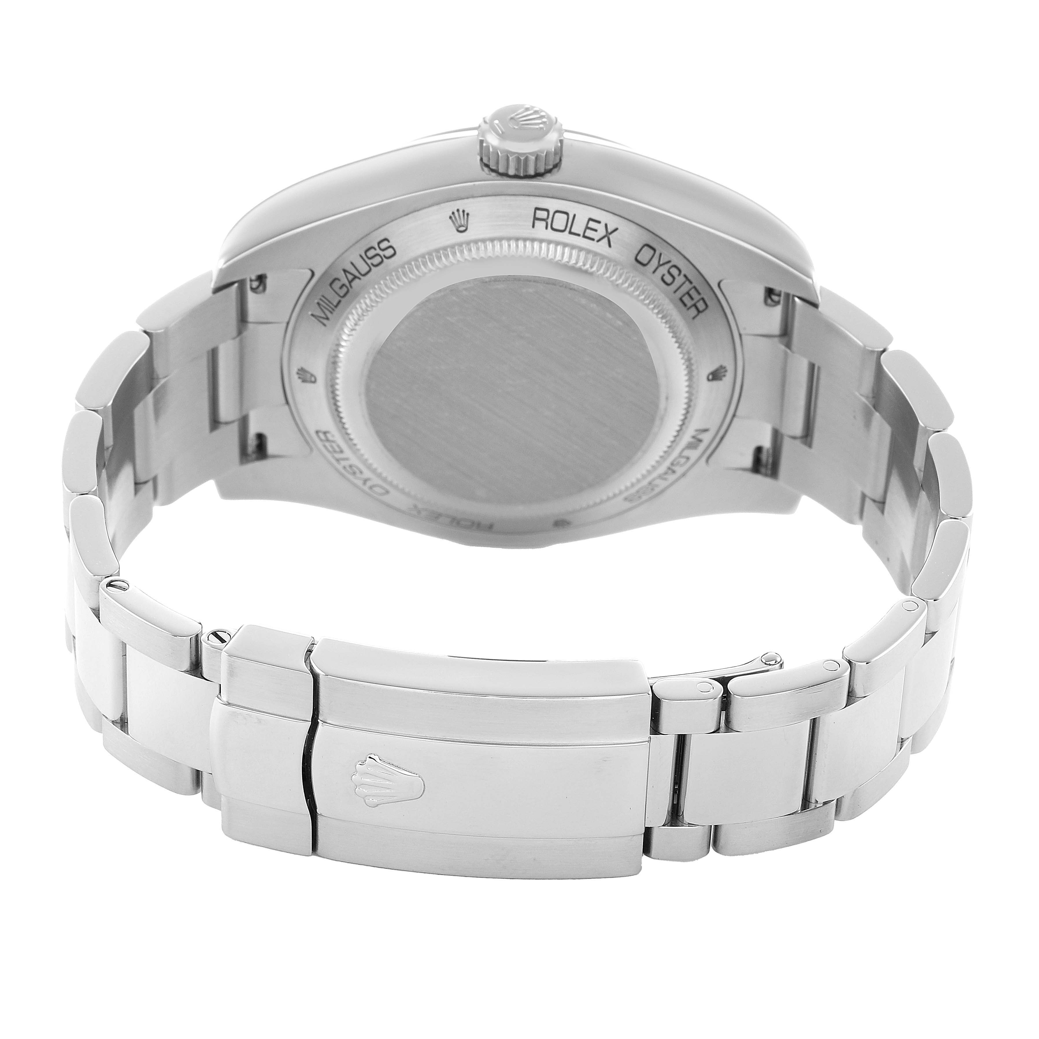The image shows the back of a Rolex Milgauss 116400 Men's Stainless Steel Black Dial watch, focusing on the case back and metal bracelet clasp.