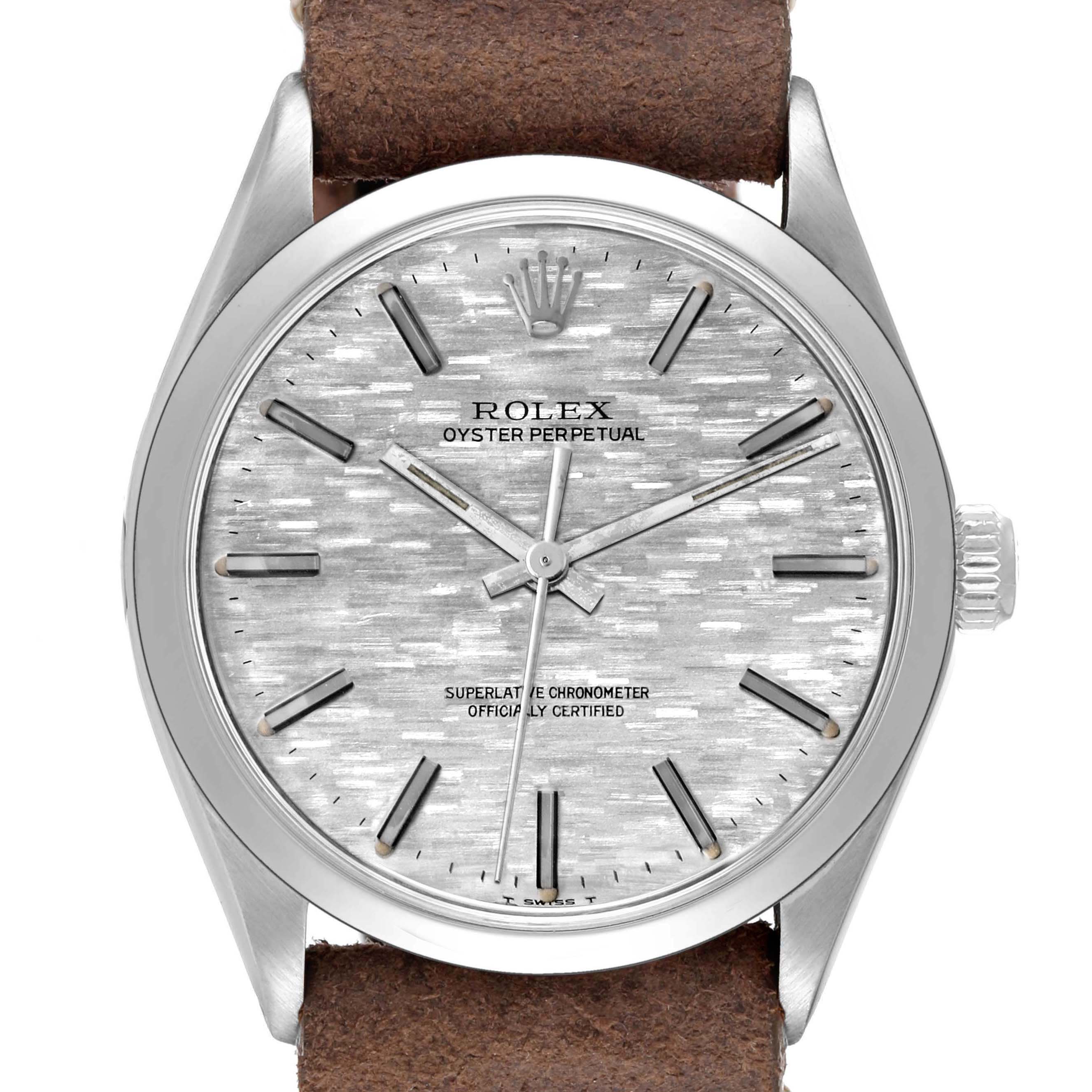 This is a front view of a Rolex Vintage Collection 1002 Men's Stainless Steel Silver Dial 1002 Men's Stainless Steel Silver Dial Oyster Perpetual watch, showcasing the face, bezel, crown, and part of the leather strap.