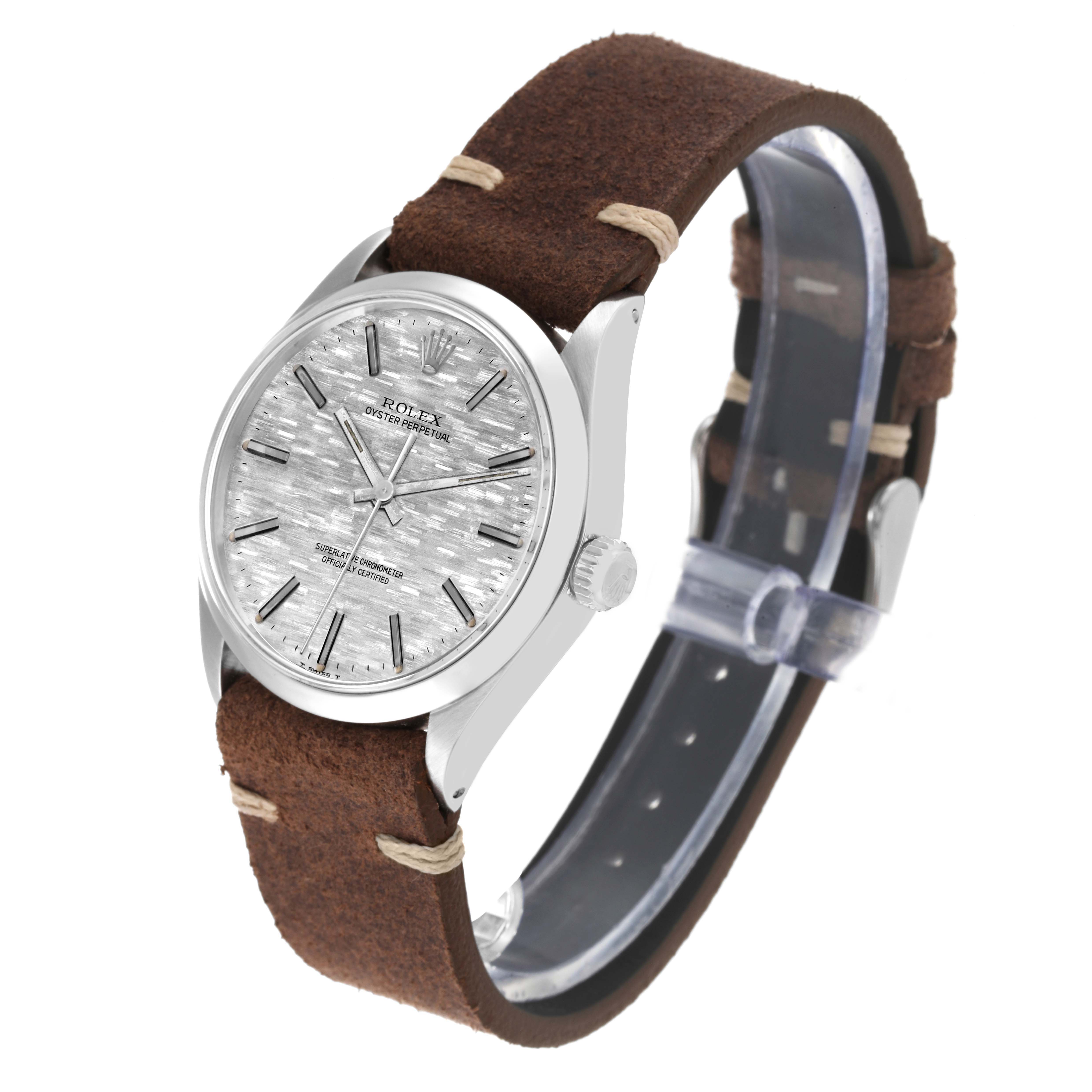 The image shows a side angled view of a Rolex Vintage Collection 1002 Men's Stainless Steel Silver Dial 1002 Men's Stainless Steel Silver Dial watch, highlighting its round dial and brown leather strap.