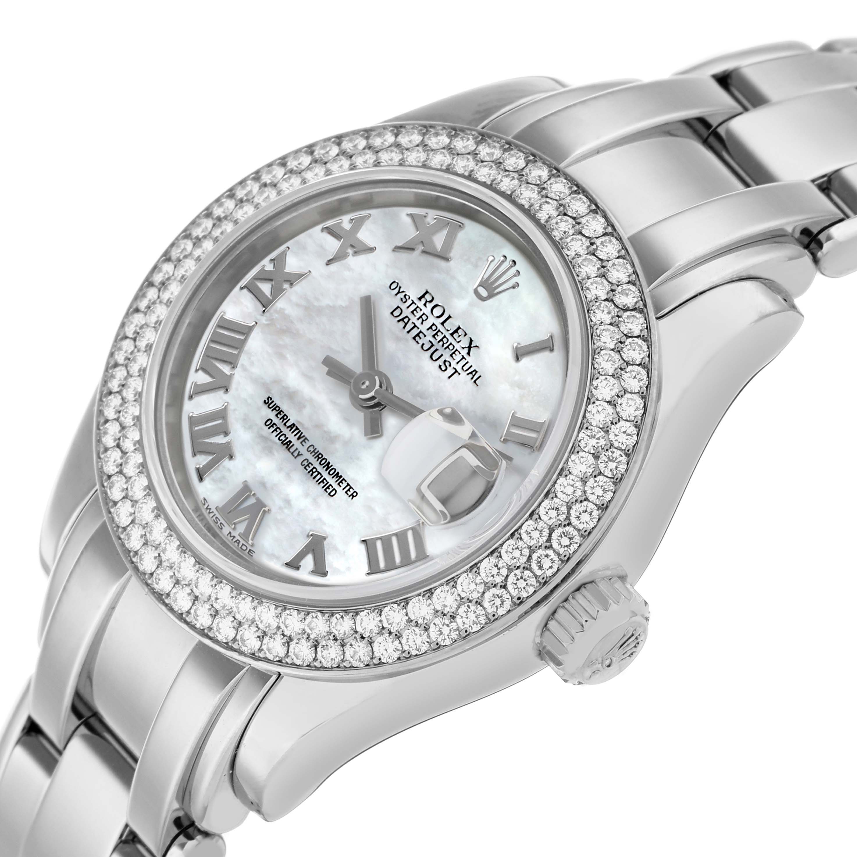 The Rolex Pearlmaster 80339 Women
s White Gold Mother of Pearl Dial watch is shown at an angle, highlighting the dial, bezel with diamonds, and part of the bracelet.