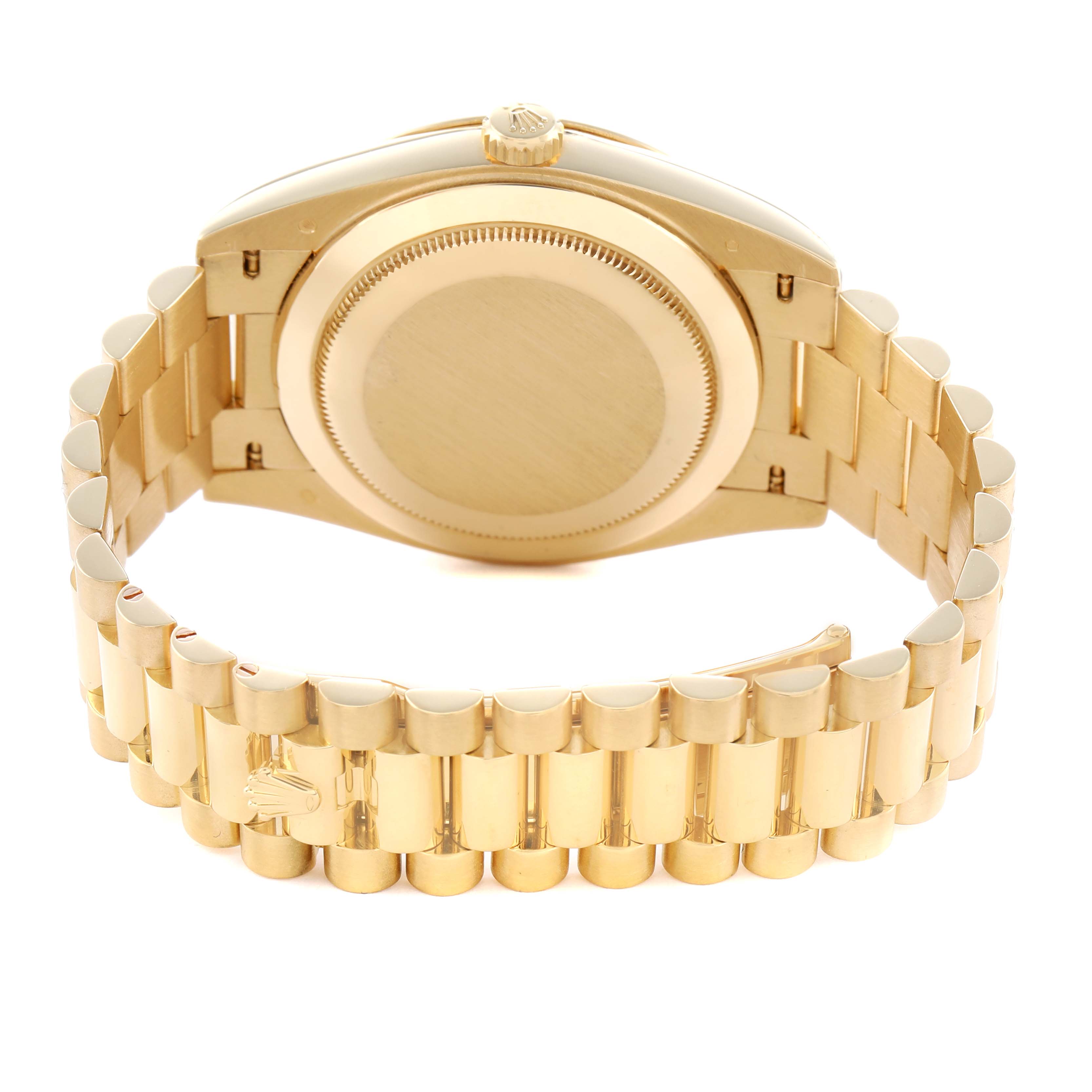 The image shows the backside of a Rolex President 228238 Men's Yellow Gold Silver Dial model watch, highlighting the case back, crown, and the President bracelet.
