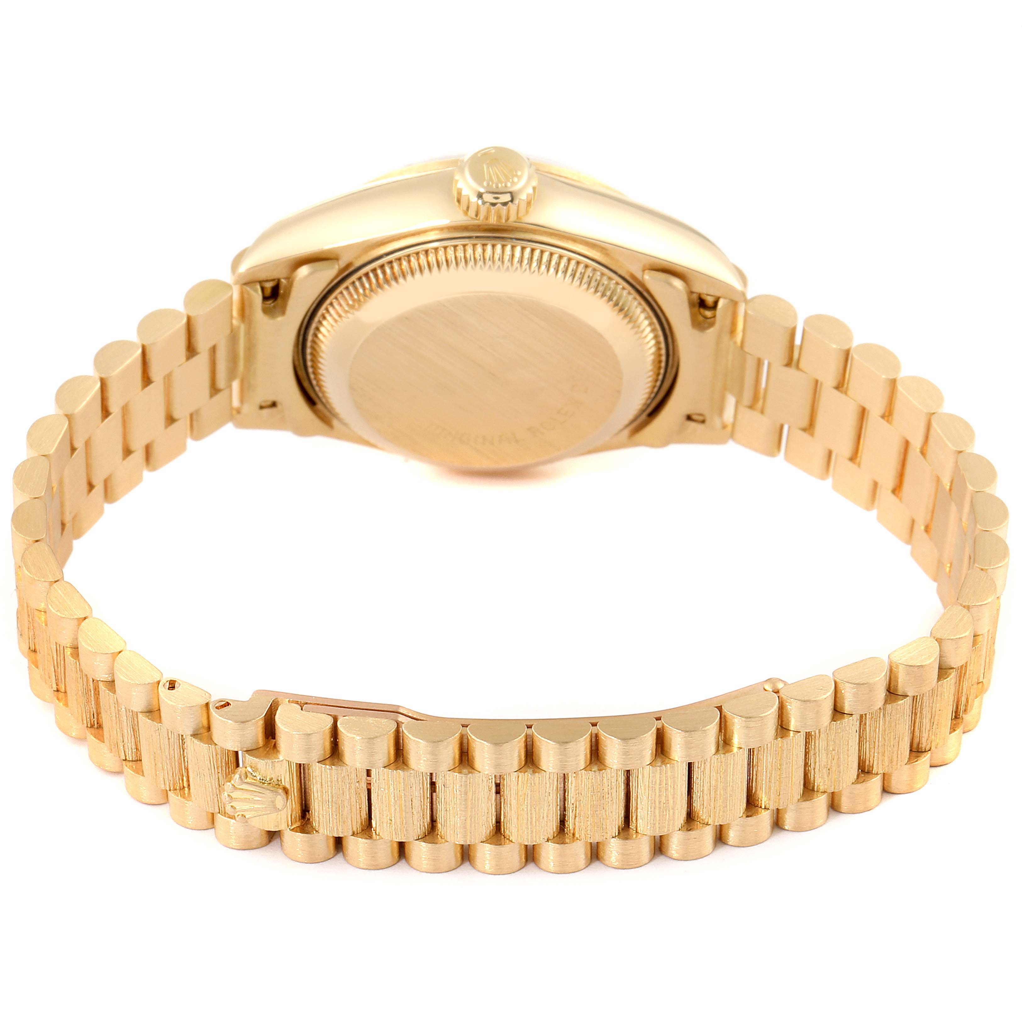 The image shows the back view of a Rolex President 69278 Women's Yellow Gold Blue Dial 69278 Women's Yellow Gold Blue Dial model, highlighting its case back and gold bracelet.