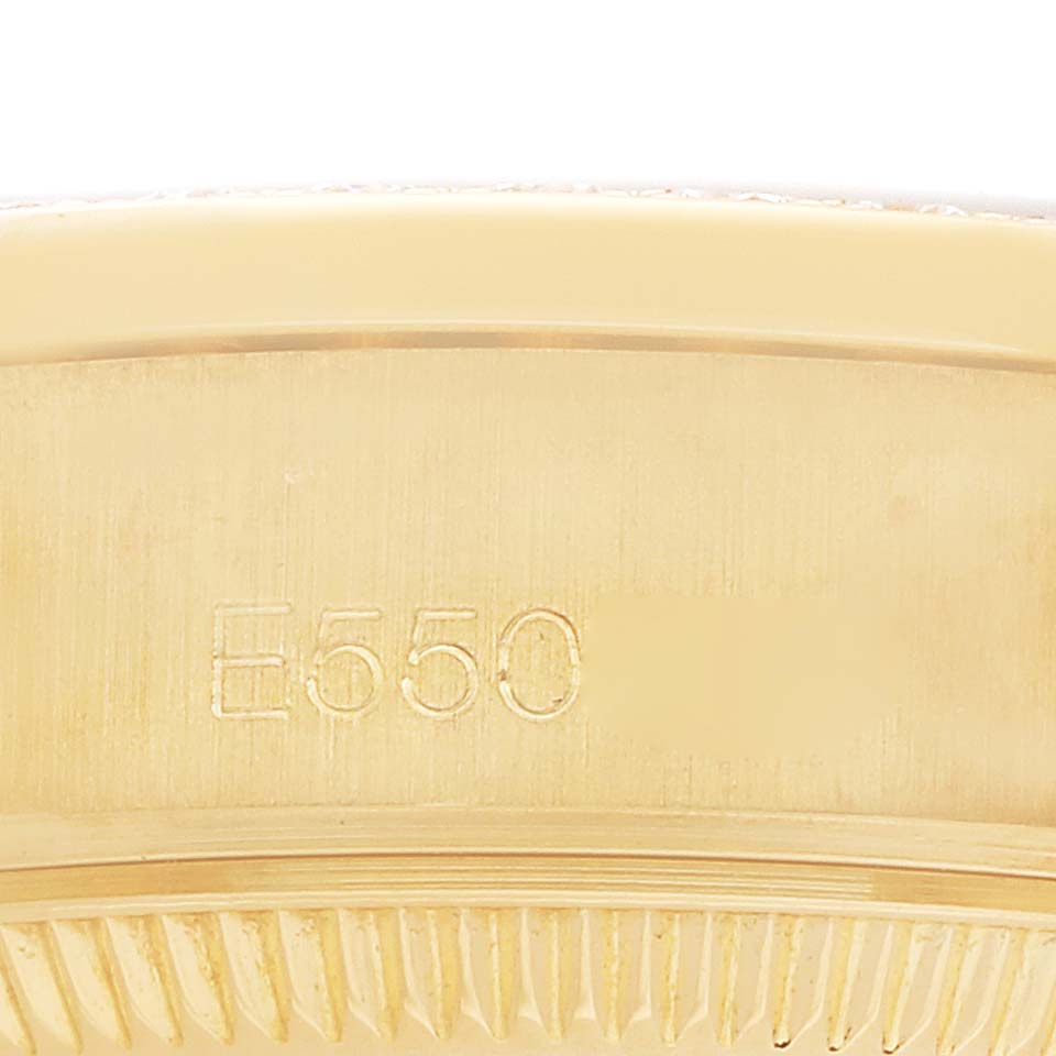 The image shows a close-up of the Rolex President 69158 Women's Yellow Gold Champagne Dial model's engraved side, highlighting the watch's reference number.