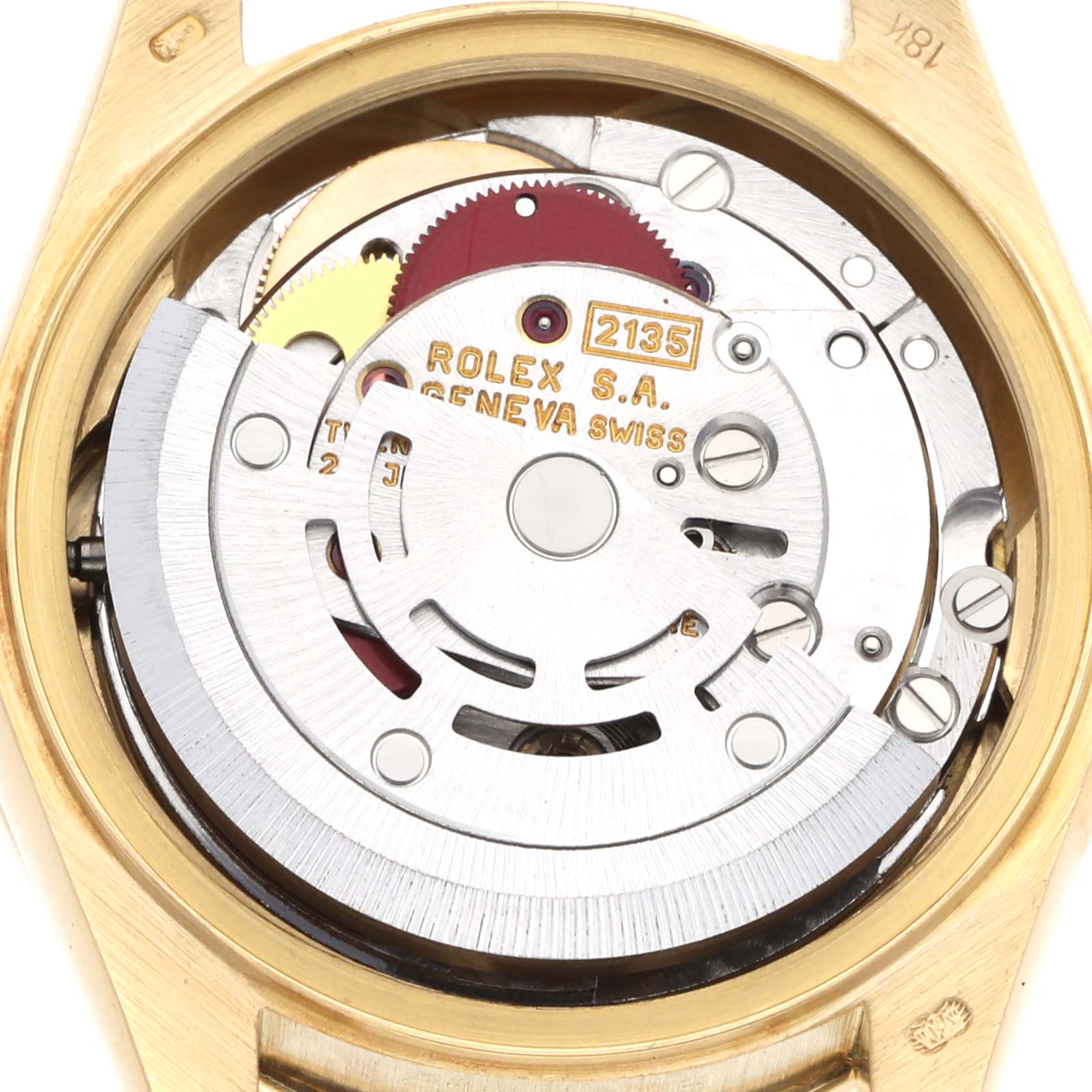 The image shows the Rolex President 69158 Women's Yellow Gold Champagne Dial model's movement from the back, highlighting gears and the rotor.