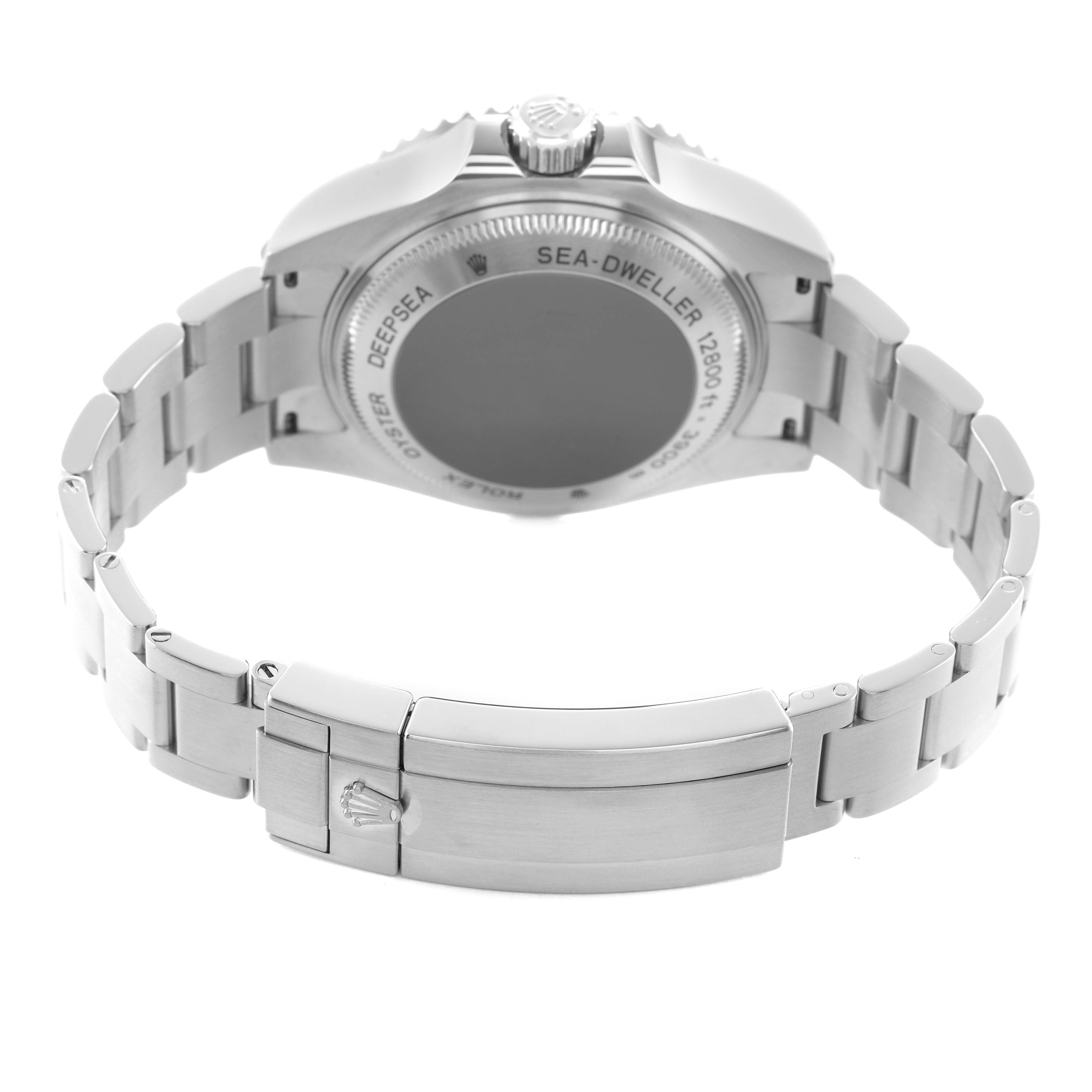 The Rolex Sea-Dweller 116660 Men's Stainless Steel Black Dial watch is shown from the back, highlighting the case back, bracelet, and clasp.