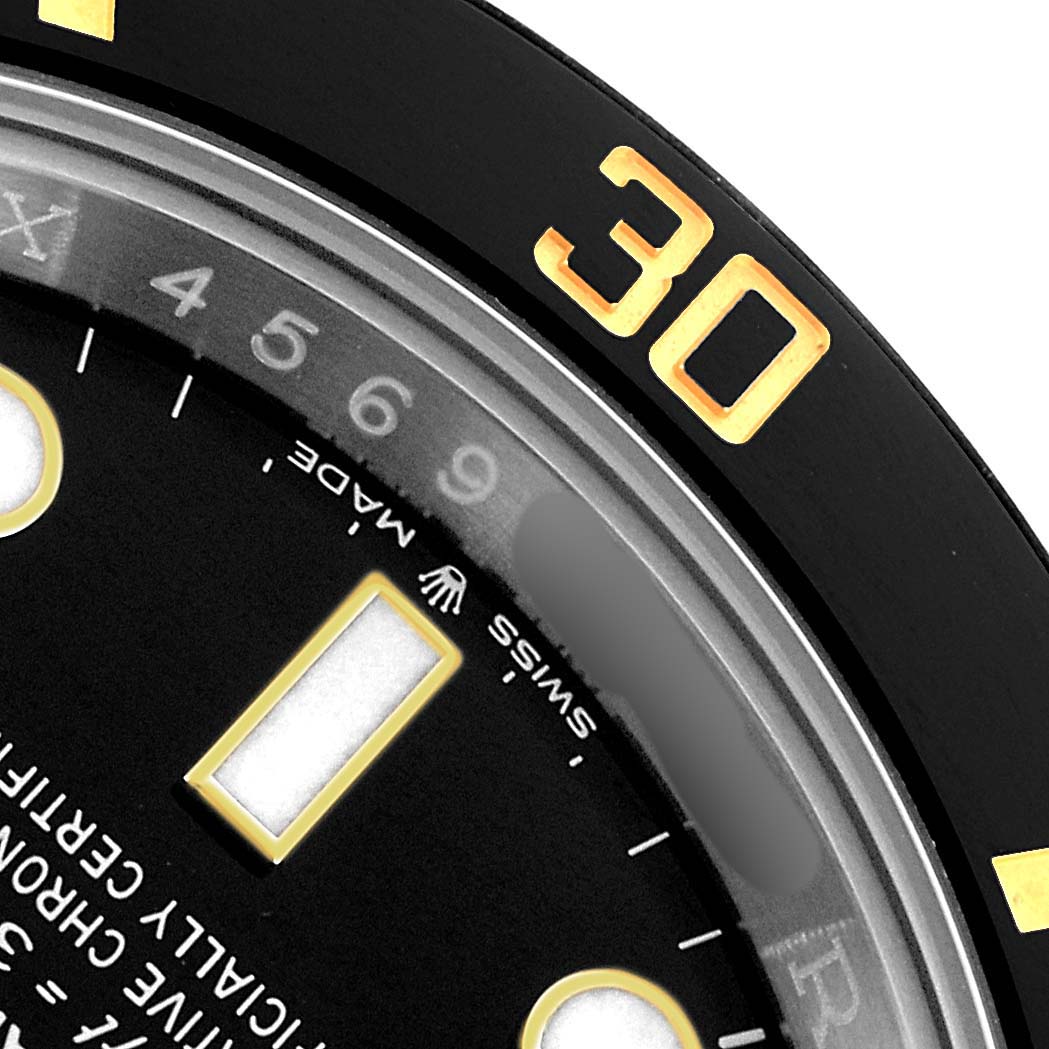 The image shows a close-up of the bezel and part of the dial of a Rolex Submariner 126613 Men's Steel and Gold (two tone) Black Dial watch, highlighting the numeral "30."