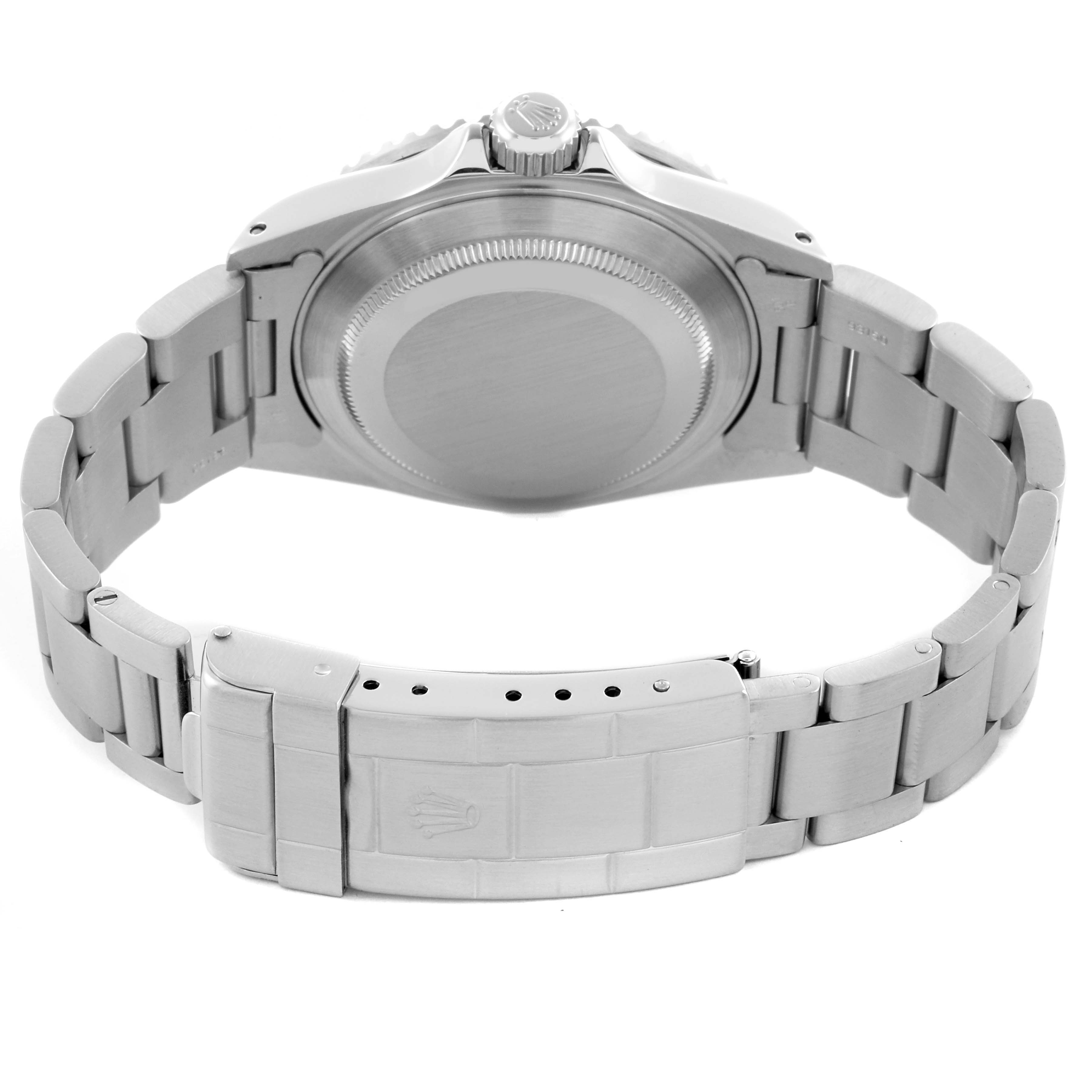 The image shows the back view of a Rolex Submariner 16610 Men
s Stainless Steel Black Dial 16610 Men
s Stainless Steel Black Dial, highlighting the bracelet and clasp.