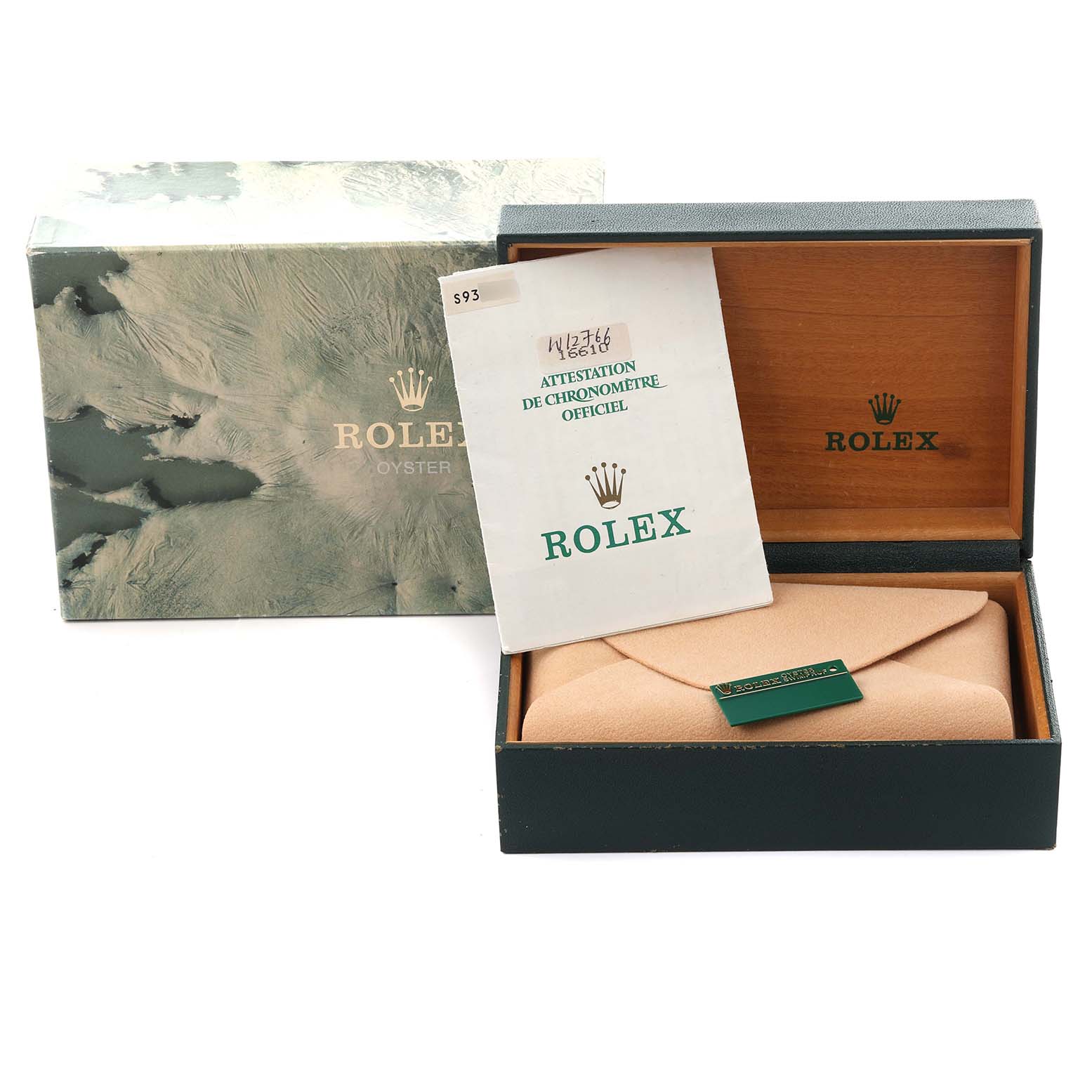 The image shows the packaging and certificate for a Rolex Submariner 16610 Men
s Stainless Steel Black Dial 16610 Men
s Stainless Steel Black Dial, including the box and document.