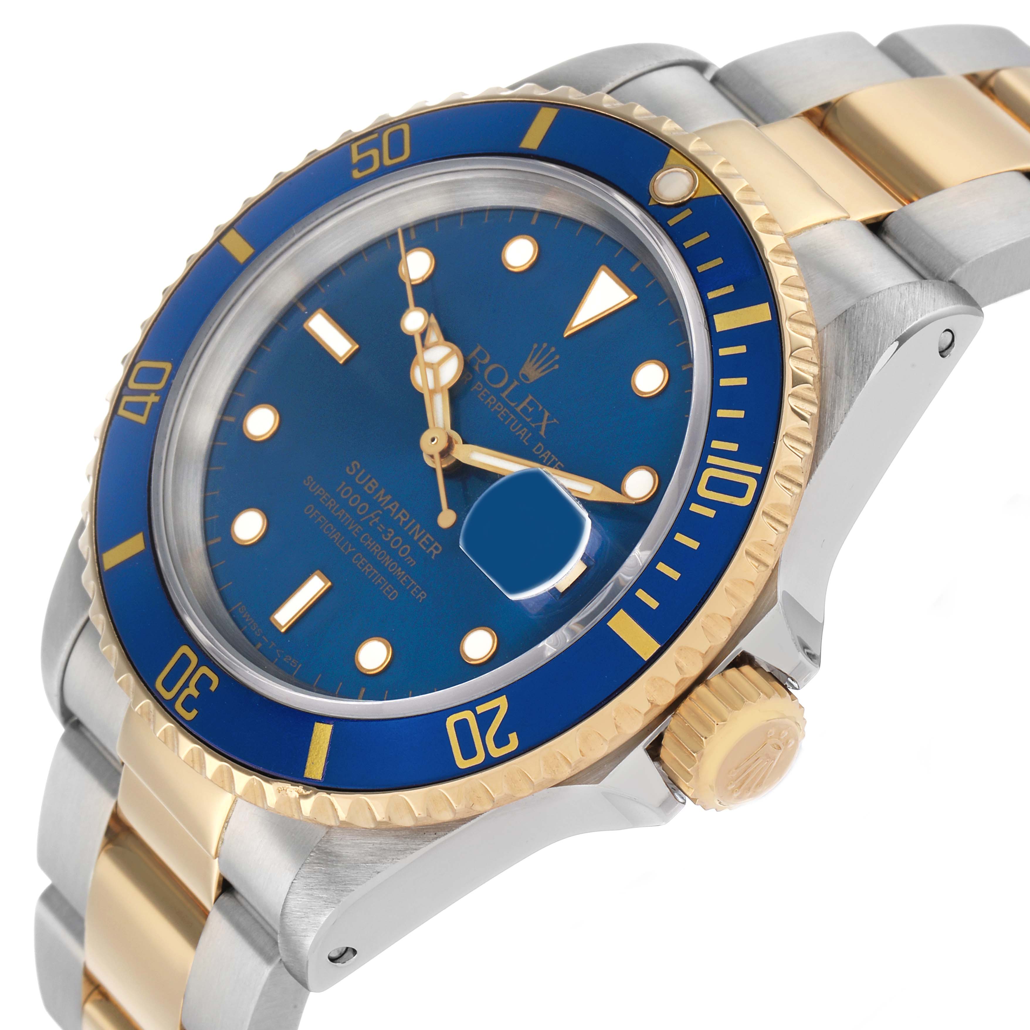 The Rolex Submariner 16613 Men's Steel and Gold (two tone) Blue Dial is shown at a slight angle displaying the bezel, dial, crown, and part of the bracelet.