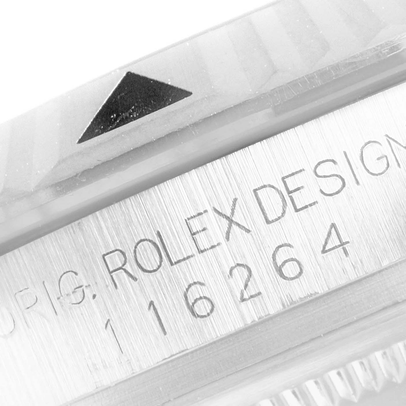This image shows a close-up of the bezel and part of the casing with model details of a Rolex Turn-o-Graph 116264 Men
s Stainless Steel White Dial 116264 Men
s Stainless Steel White Dial watch.