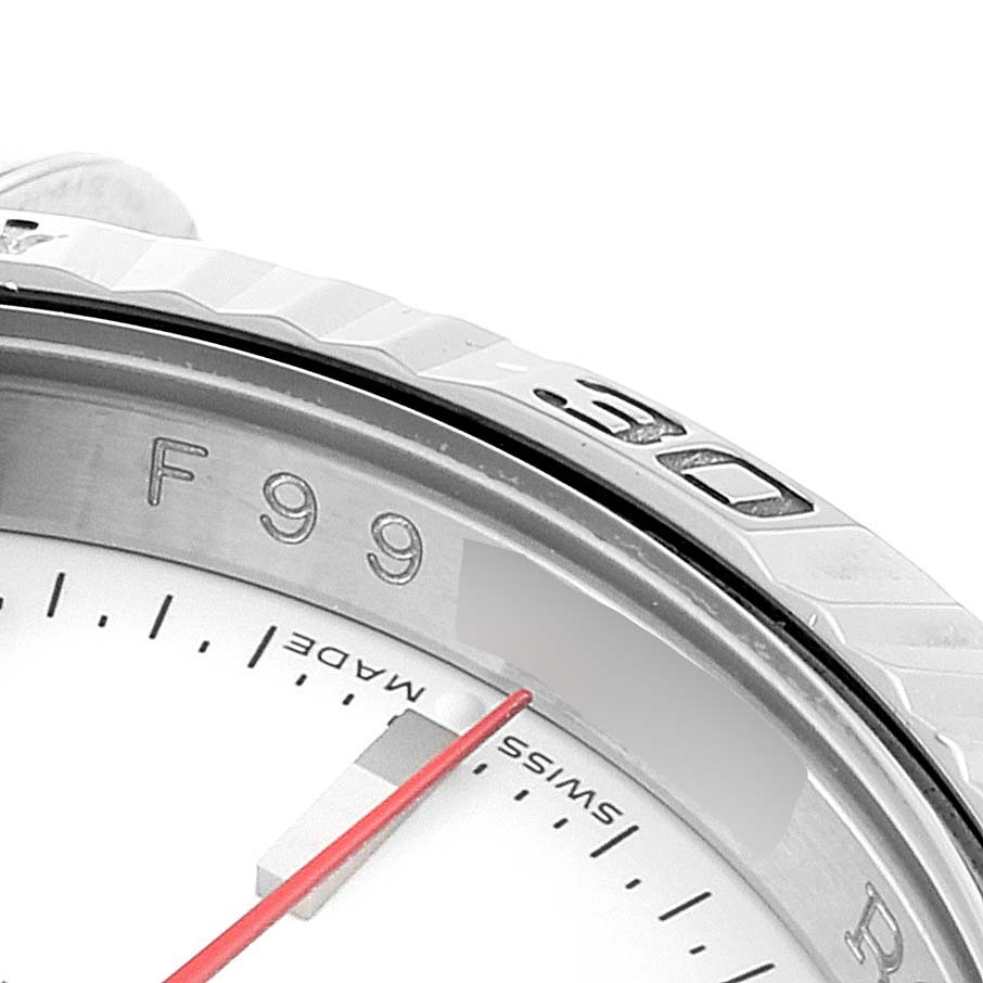 The image shows a close-up of the bezel and partial dial, including the minute markers and part of the second hand of the Rolex Turn-o-Graph 116264 Men
s Stainless Steel White Dial 116264 Men
s Stainless Steel White Dial watch.