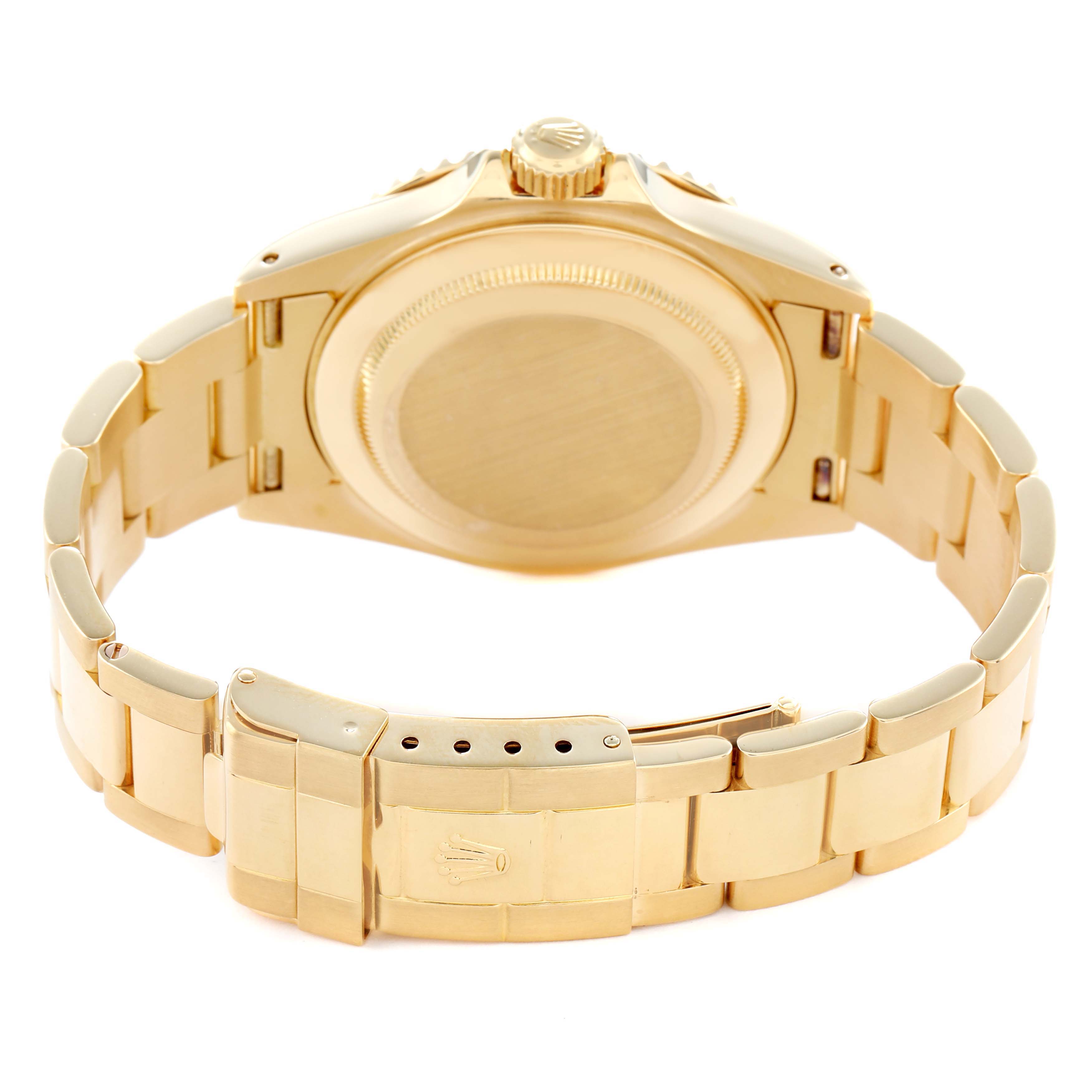 The image shows the back view of a Rolex Yacht-Master 16628B Men's Yellow Gold White Dial watch, highlighting the case back, crown, and bracelet clasp.