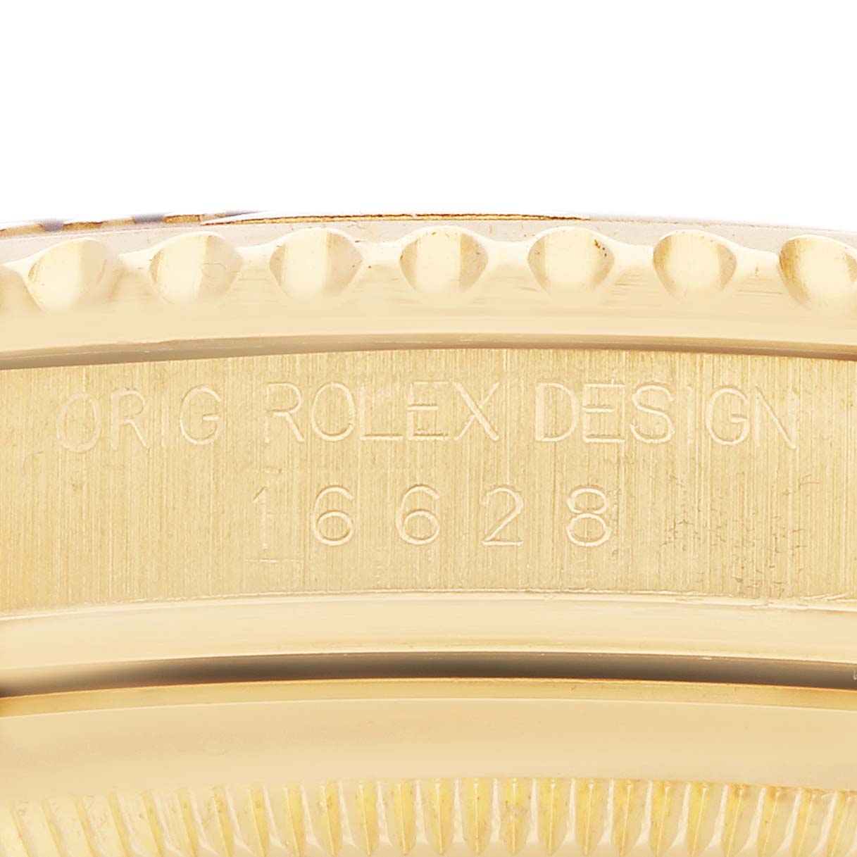 The image shows a close-up side view of the Rolex Yacht-Master 16628B Men's Yellow Gold White Dial's case with engraved model details.