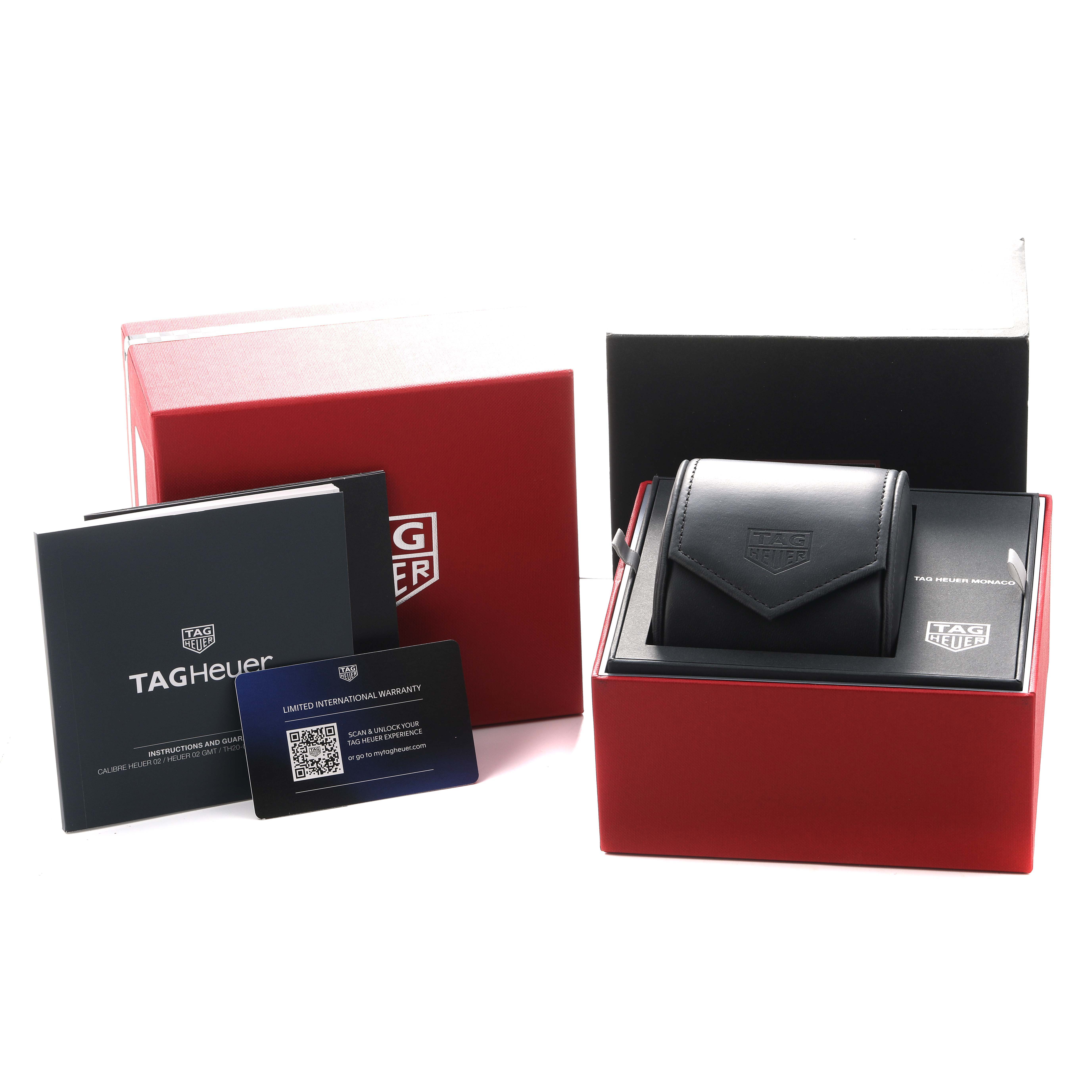 The image shows the packaging and accessories for the Tag Heuer Monaco CBL2188.FT6261 Men's Titanium Blue Dial model, including a watch box, warranty card, and manuals.