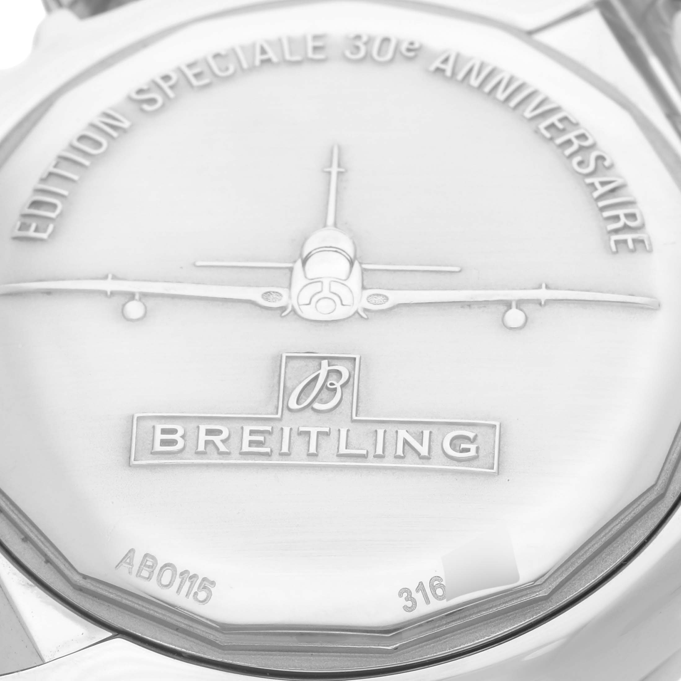 The image shows the case back of the Breitling Chronomat AB0115 Men
s Stainless Steel Silver Dial AB0115 Men
s Stainless Steel Silver Dial, highlighting its special edition engraving.